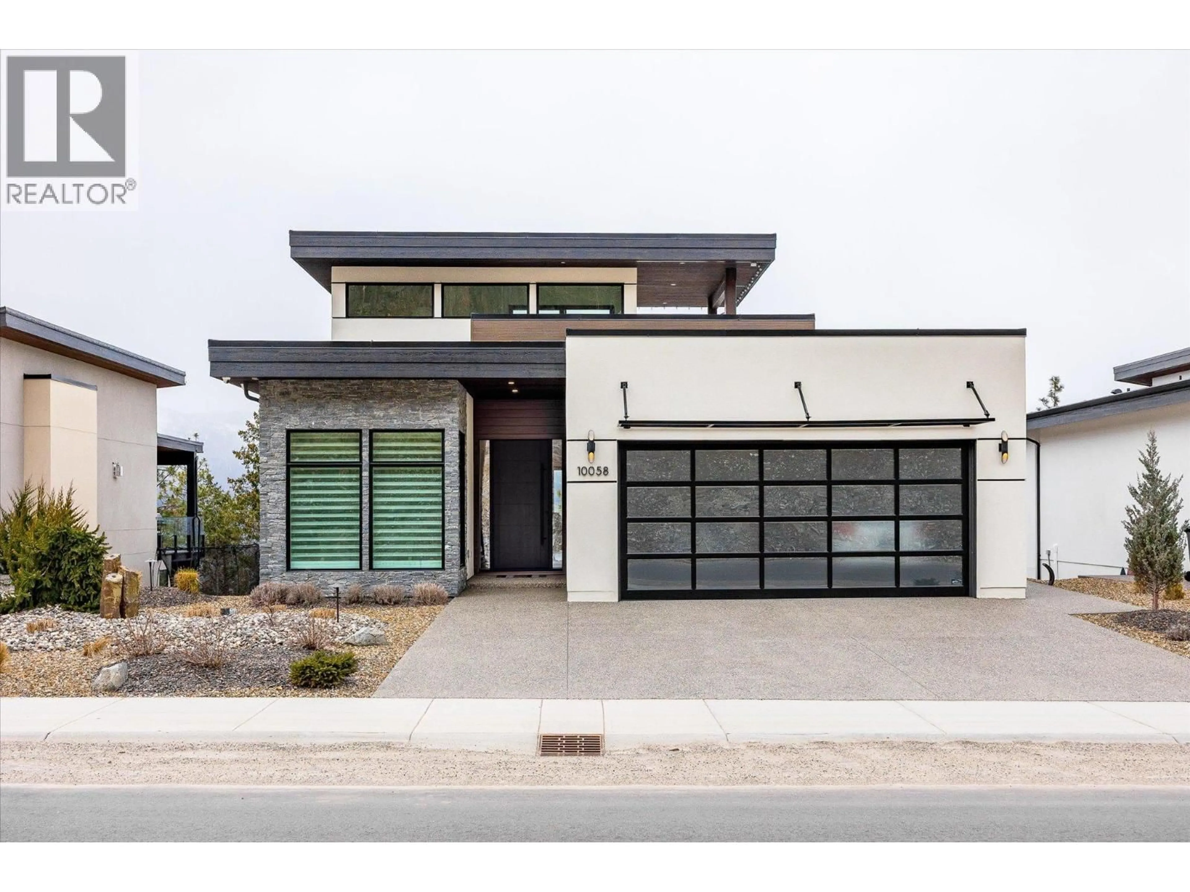 Home with brick exterior material, street for 10058 BEACON HILL DRIVE, Lake Country British Columbia V4V0A9