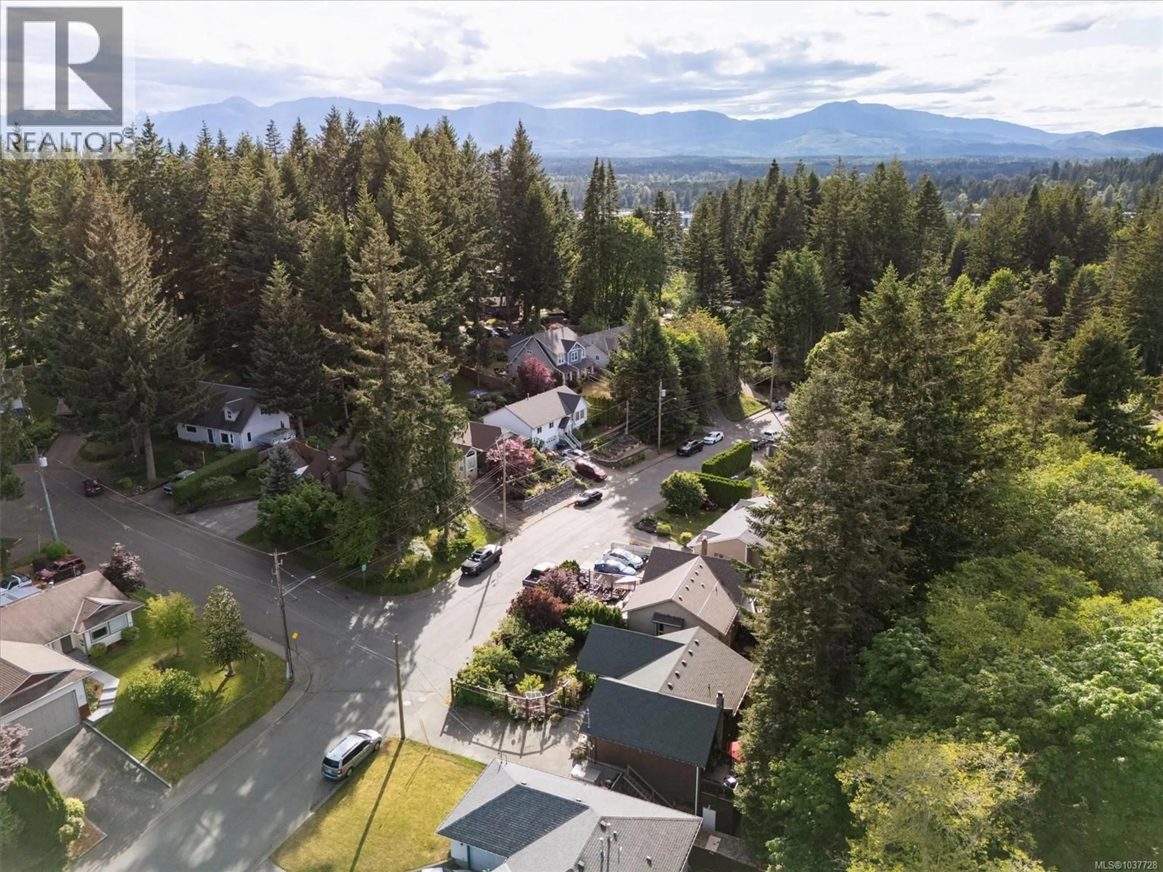 A pic from outside/outdoor area/front of a property/back of a property/a pic from drone, mountain view for 1456 HURFORD AVENUE, Courtenay British Columbia V9N6X3