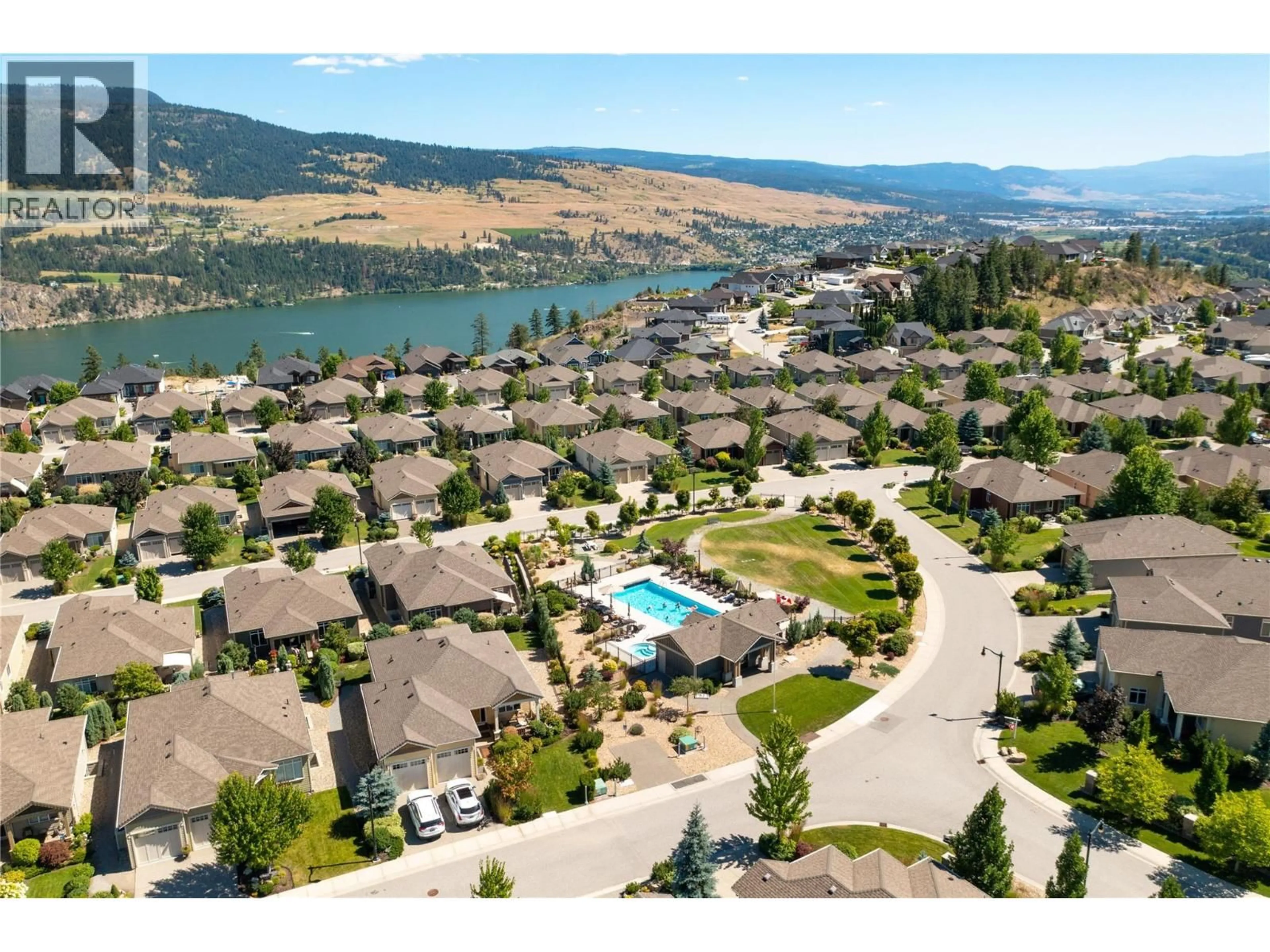 A pic from outside/outdoor area/front of a property/back of a property/a pic from drone, water/lake/river/ocean view for 13008 GIBBONS DRIVE, Lake Country British Columbia V4V2S4