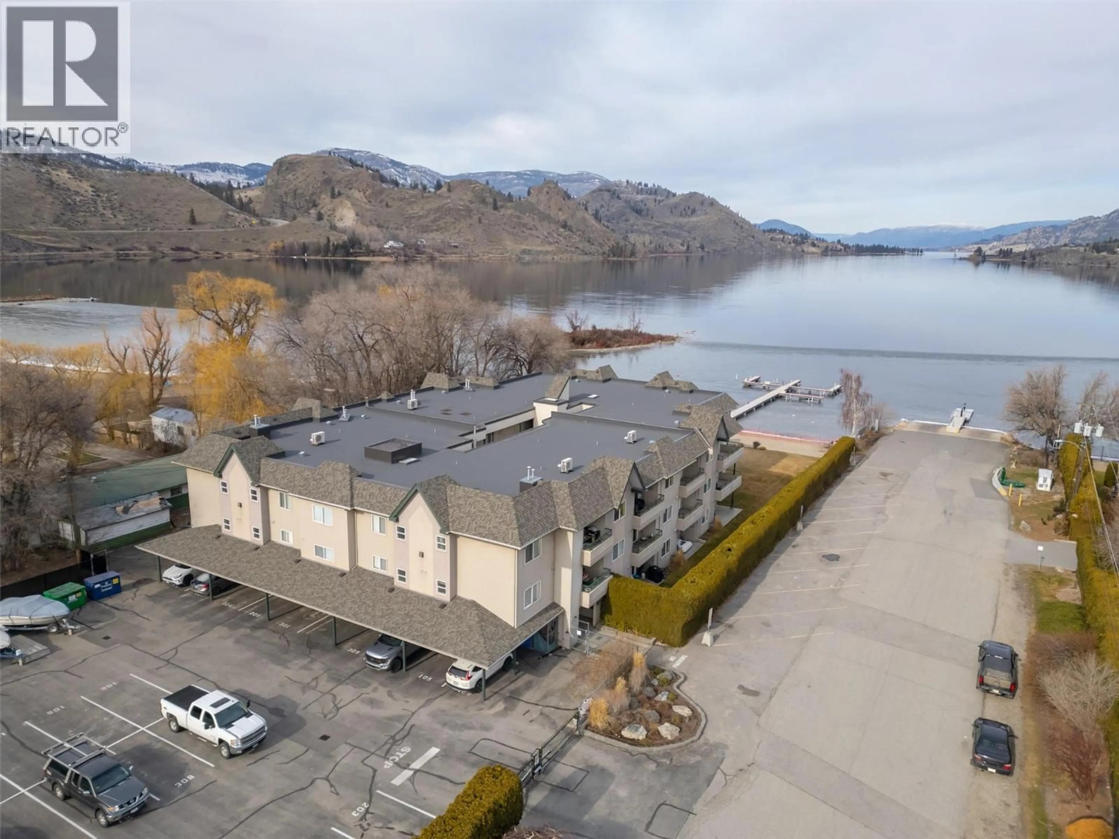 A pic from outside/outdoor area/front of a property/back of a property/a pic from drone, water/lake/river/ocean view for 108 - 640 MAIN STREET, Okanagan Falls British Columbia V0H1R4