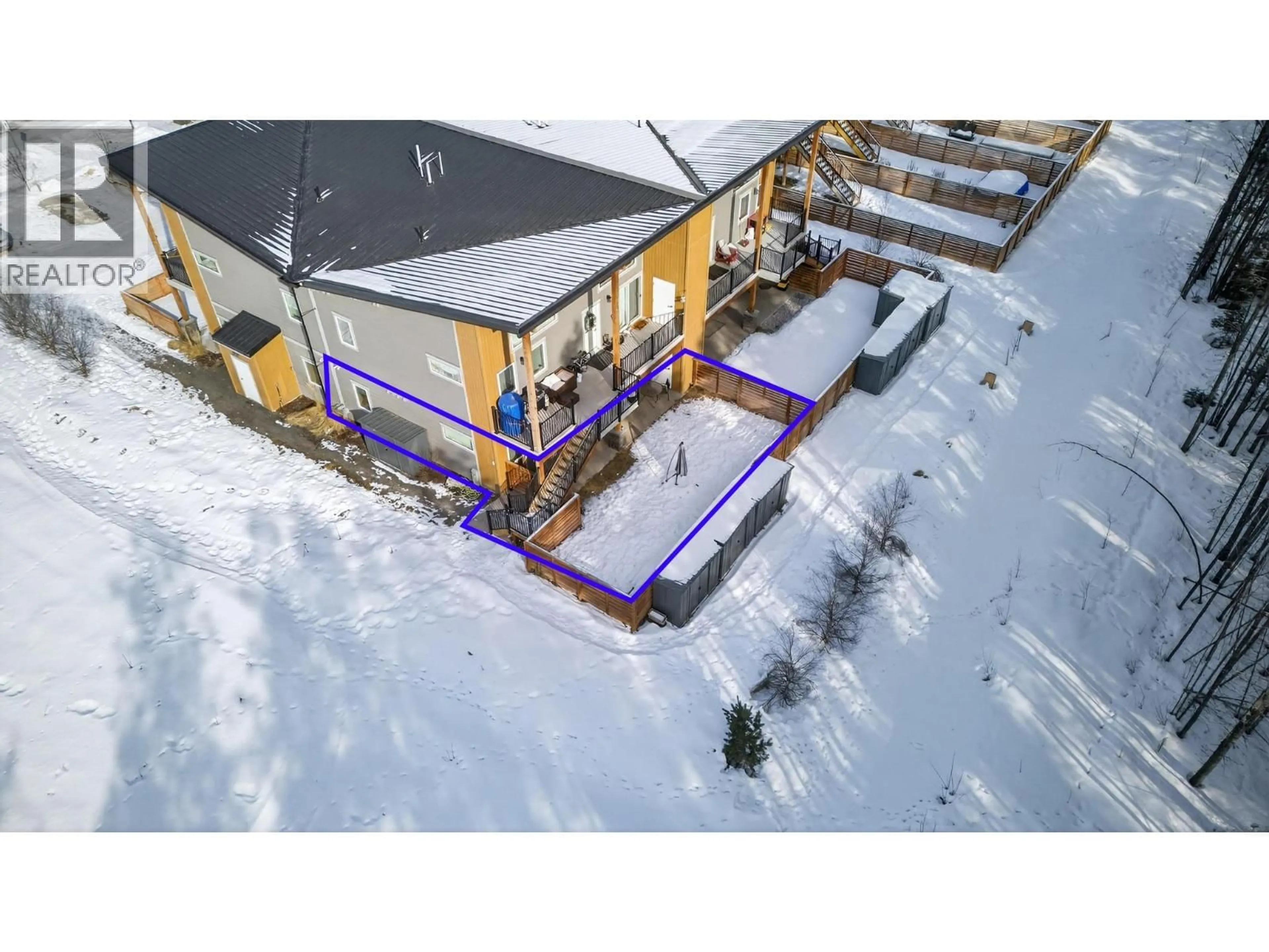 A pic from outside/outdoor area/front of a property/back of a property/a pic from drone, building for 8 - 1512 GRANITE DRIVE, Golden British Columbia V0A1H3