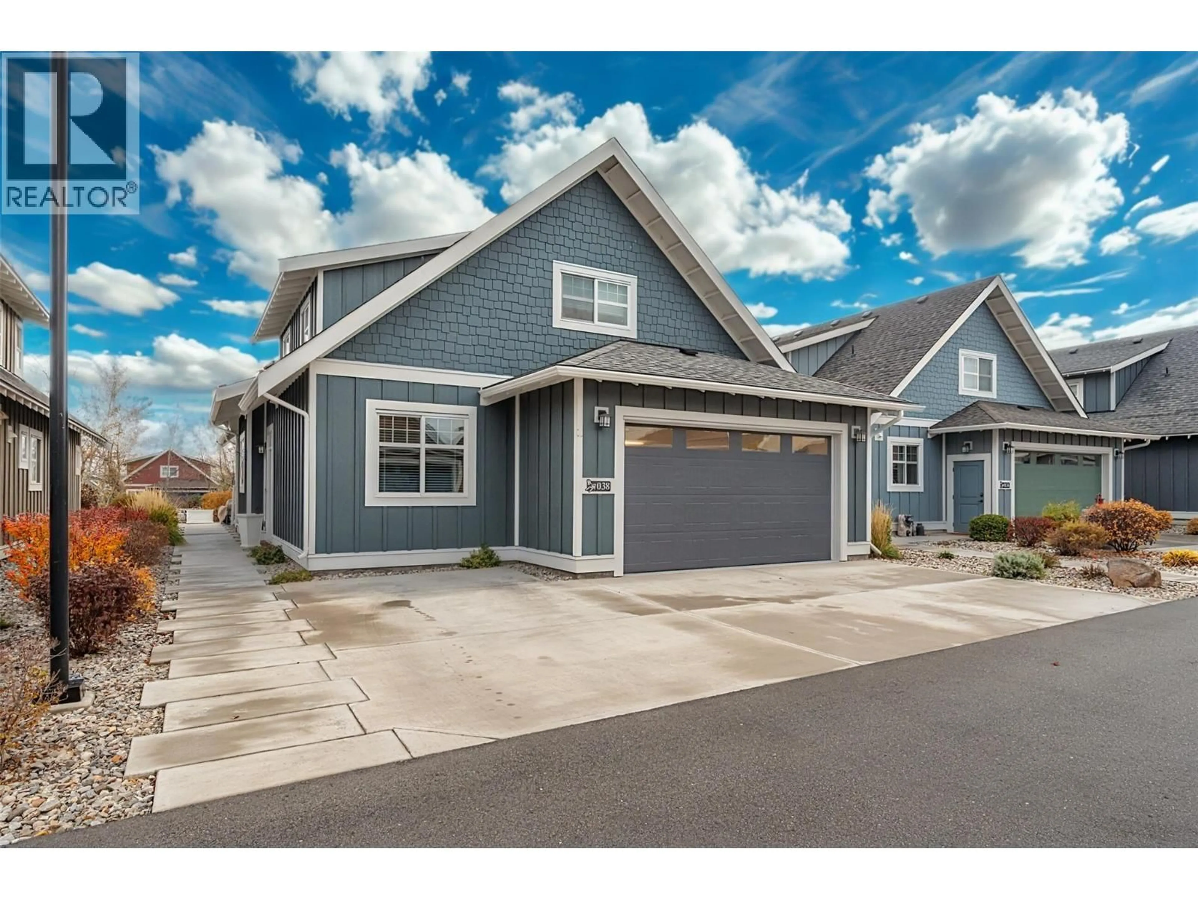 Home with vinyl exterior material, street for 38 - 2450 RADIO TOWER ROAD, Oliver British Columbia V0H1T1