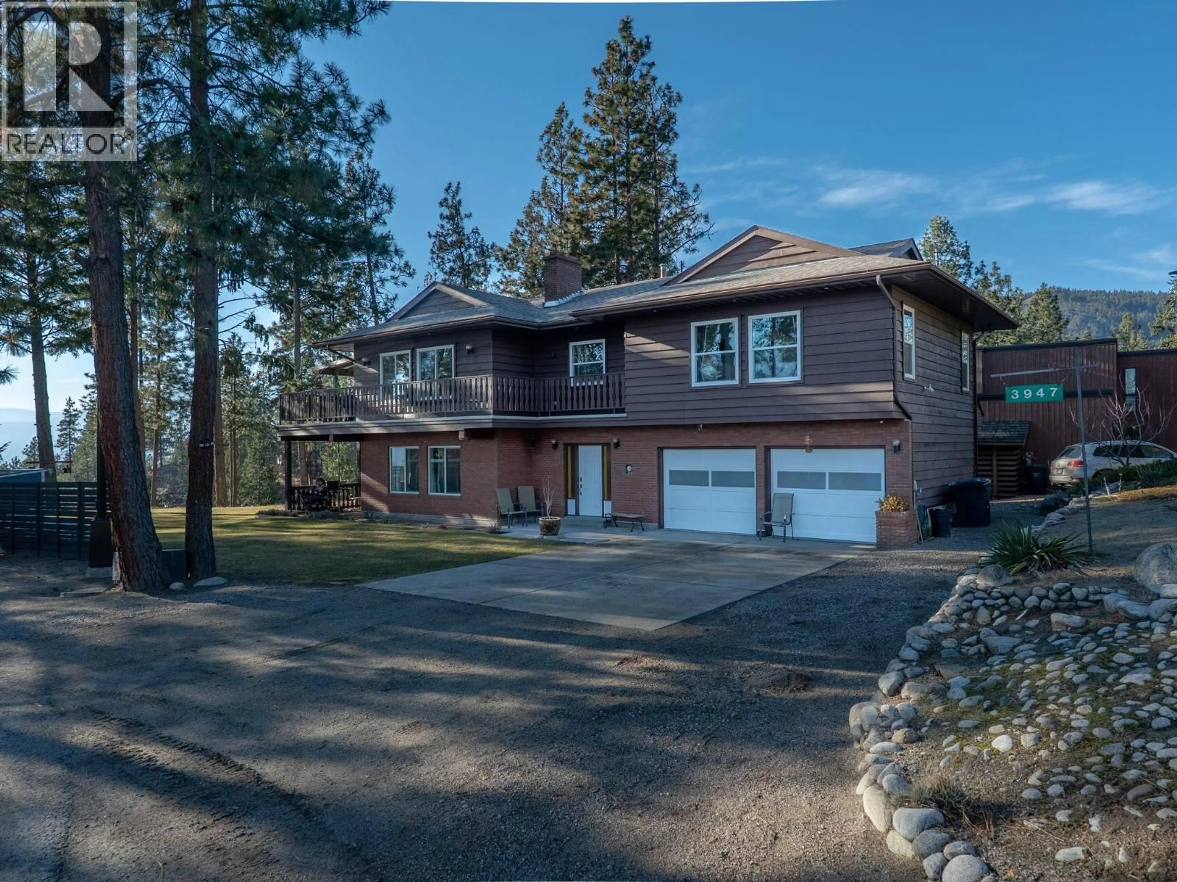 Home with brick exterior material, street for 3947 TREPANIER HEIGHTS PLACE, Peachland British Columbia V0H1X2
