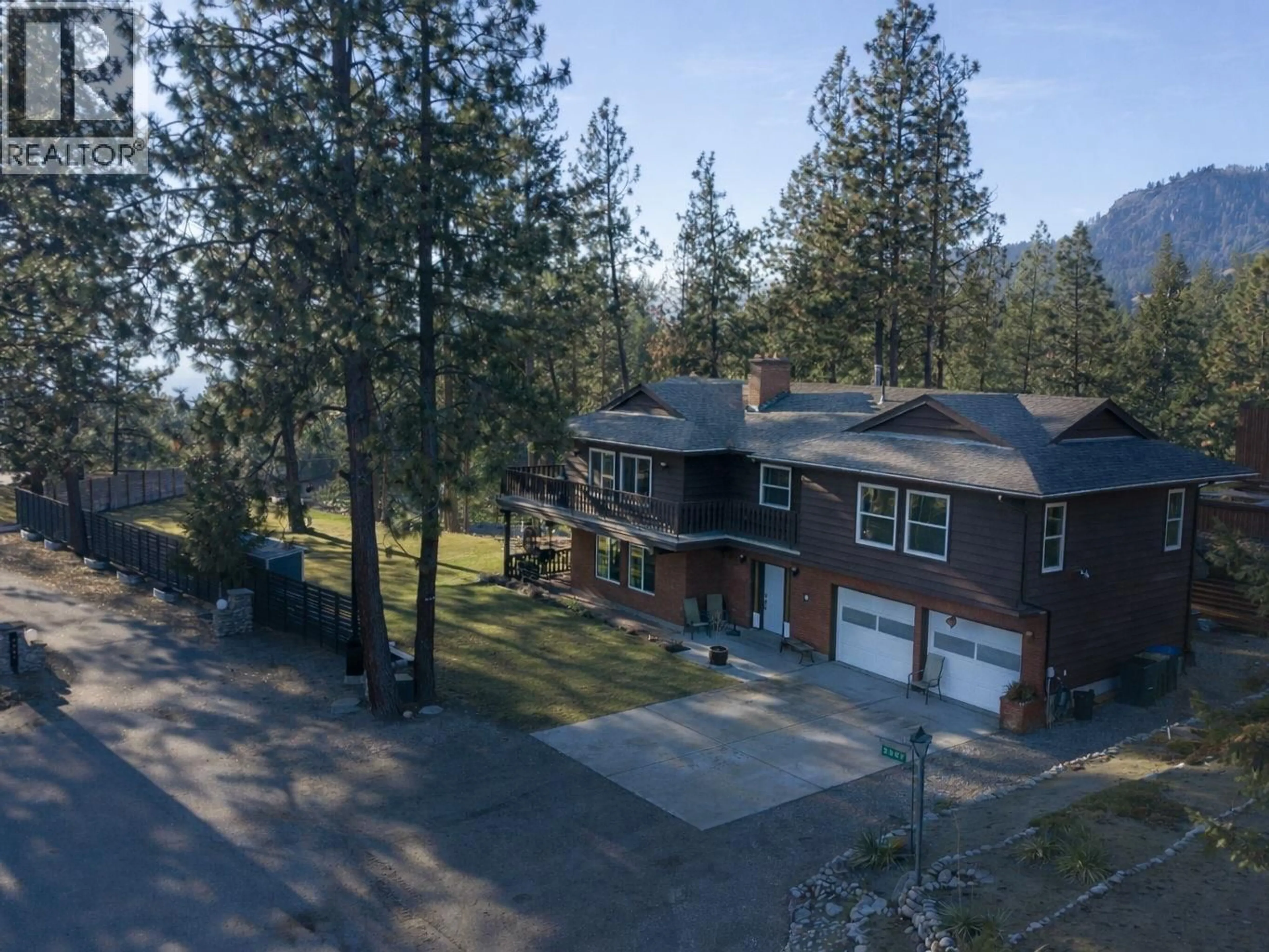 A pic from outside/outdoor area/front of a property/back of a property/a pic from drone, mountain view for 3947 TREPANIER HEIGHTS PLACE, Peachland British Columbia V0H1X2