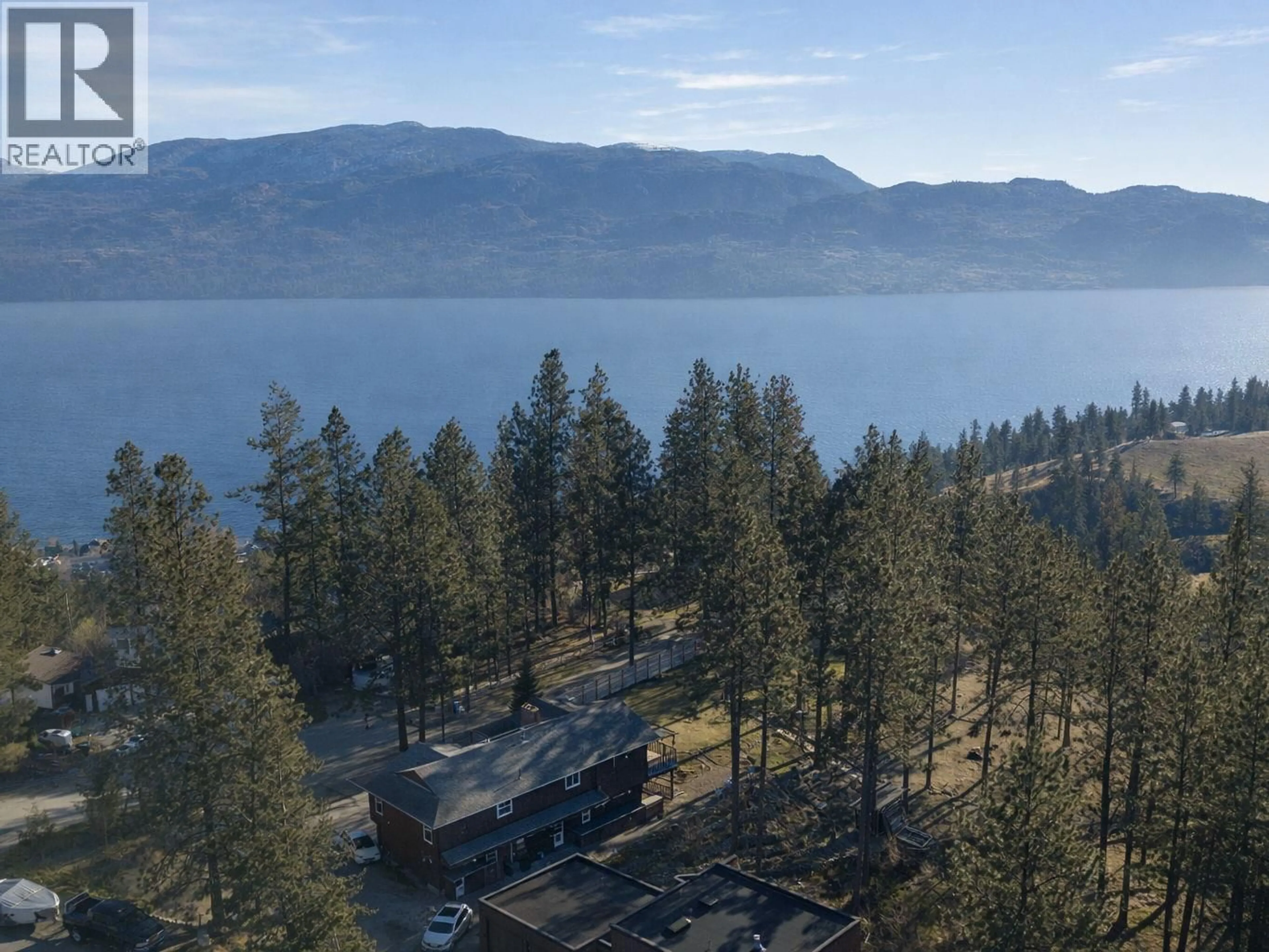 A pic from outside/outdoor area/front of a property/back of a property/a pic from drone, unknown for 3947 TREPANIER HEIGHTS PLACE, Peachland British Columbia V0H1X2