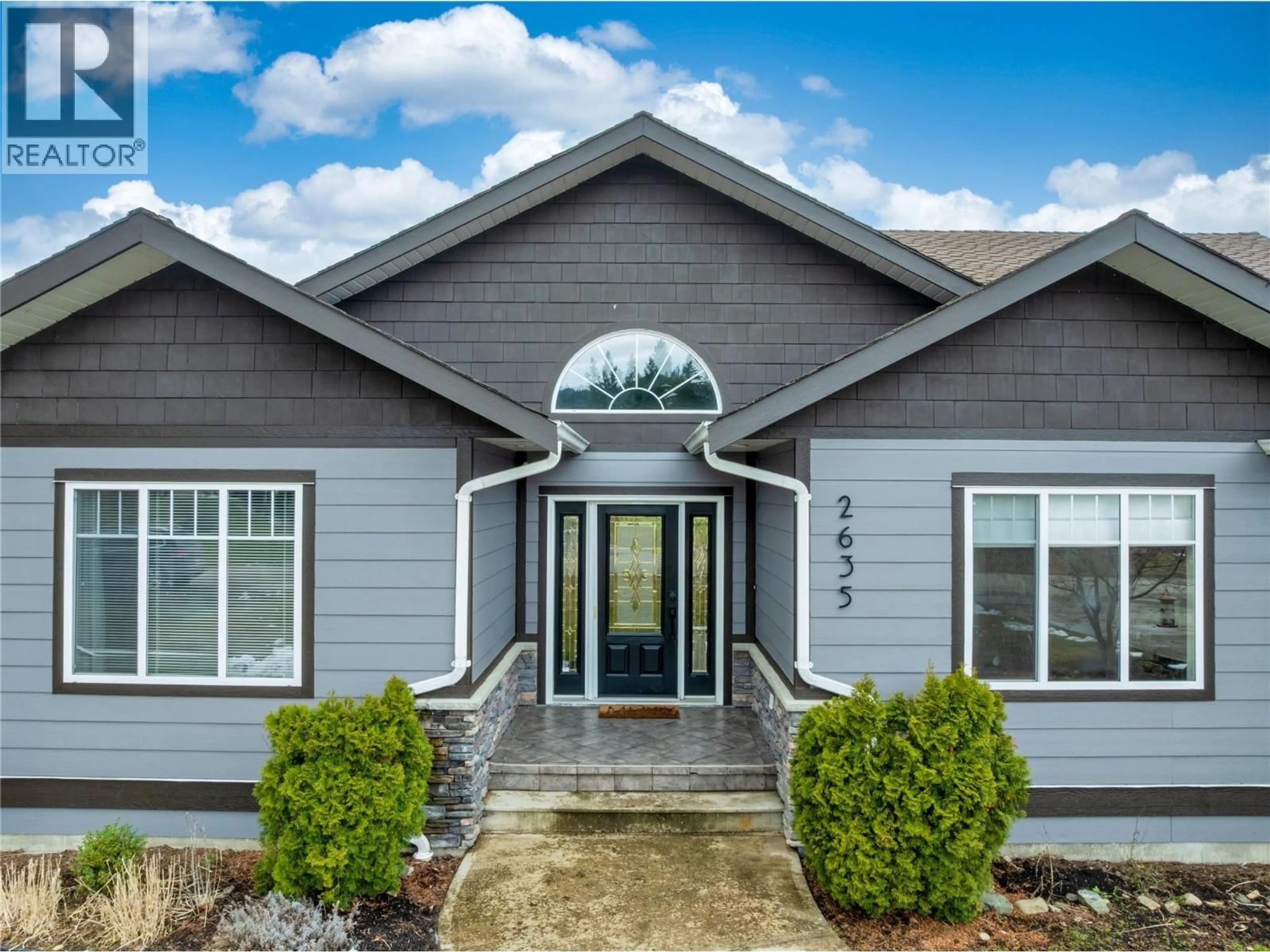 Home with vinyl exterior material, street for 2635 GOLF VIEW PLACE, Blind Bay British Columbia V0E1H2