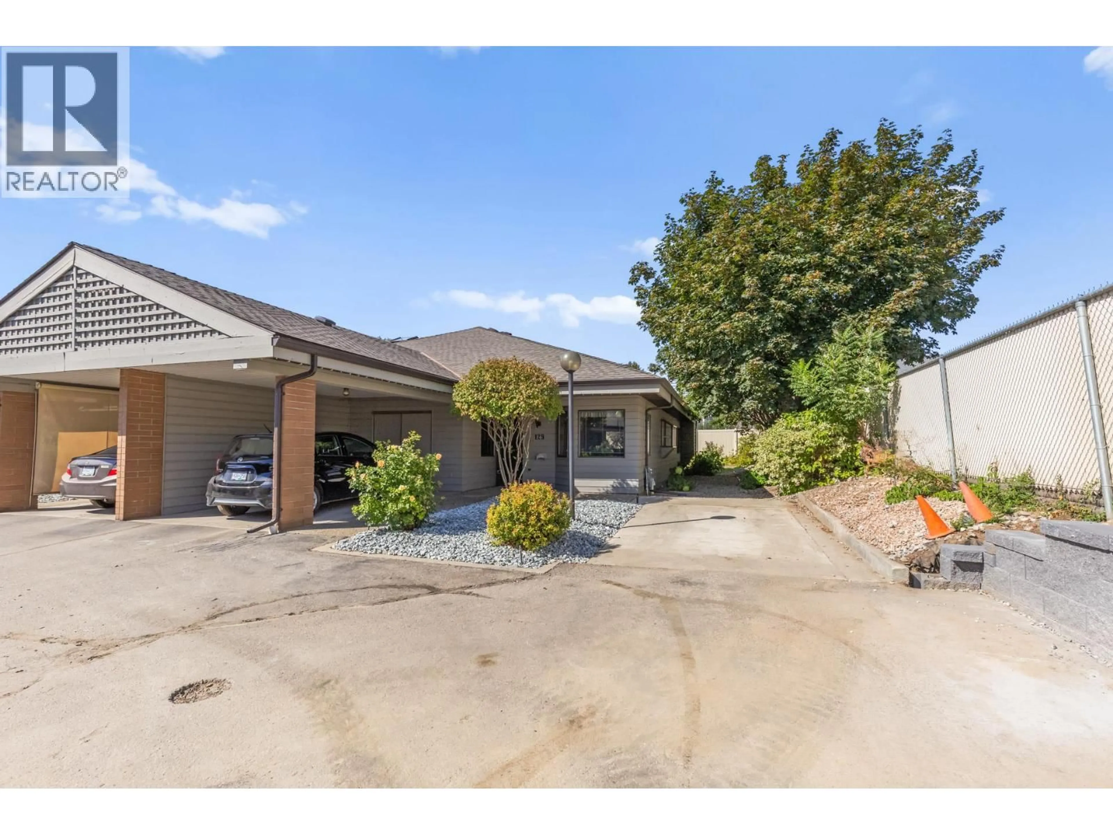 A pic from outside/outdoor area/front of a property/back of a property/a pic from drone, street for 129 - 1765 LECKIE ROAD, Kelowna British Columbia V1X6X5