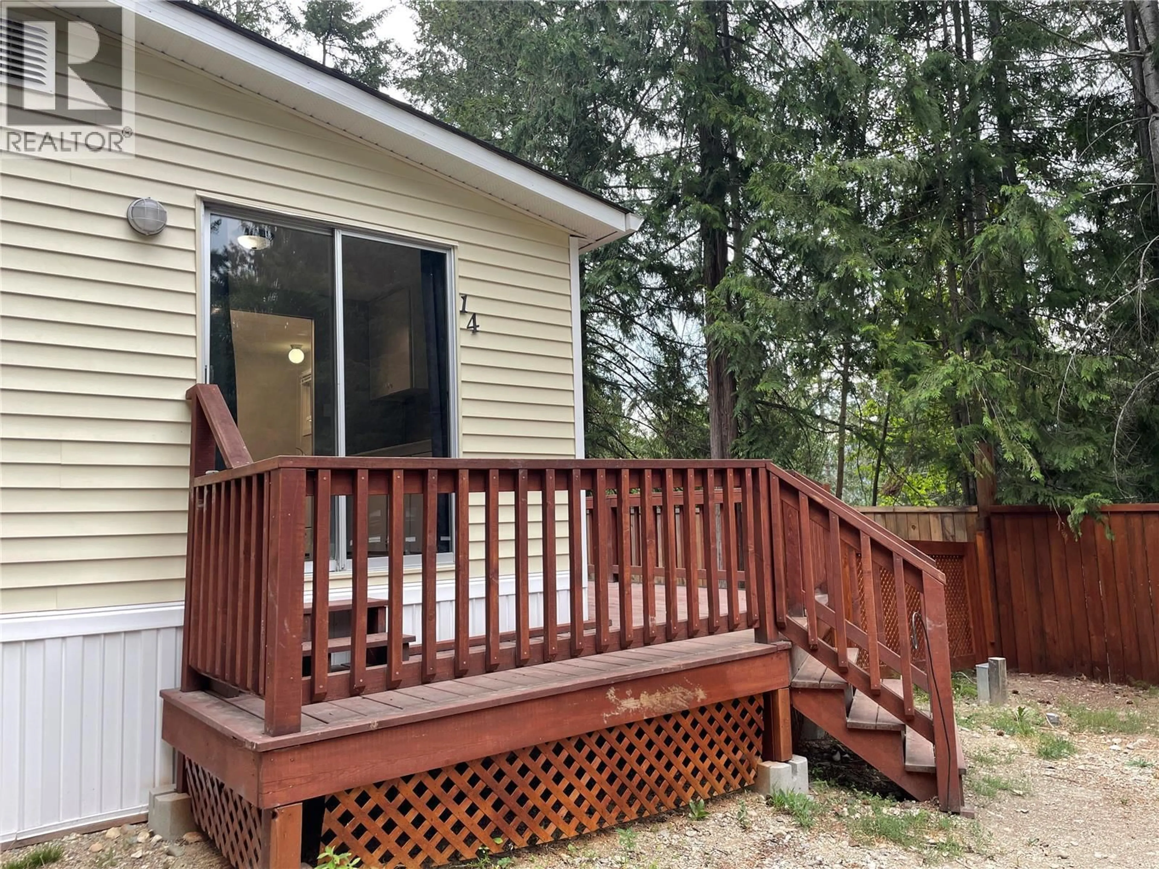 Home with vinyl exterior material, forest/trees view for 14 - 2036 SOLSQUA-SICAMOUS ROAD, Sicamous British Columbia V0E2V4