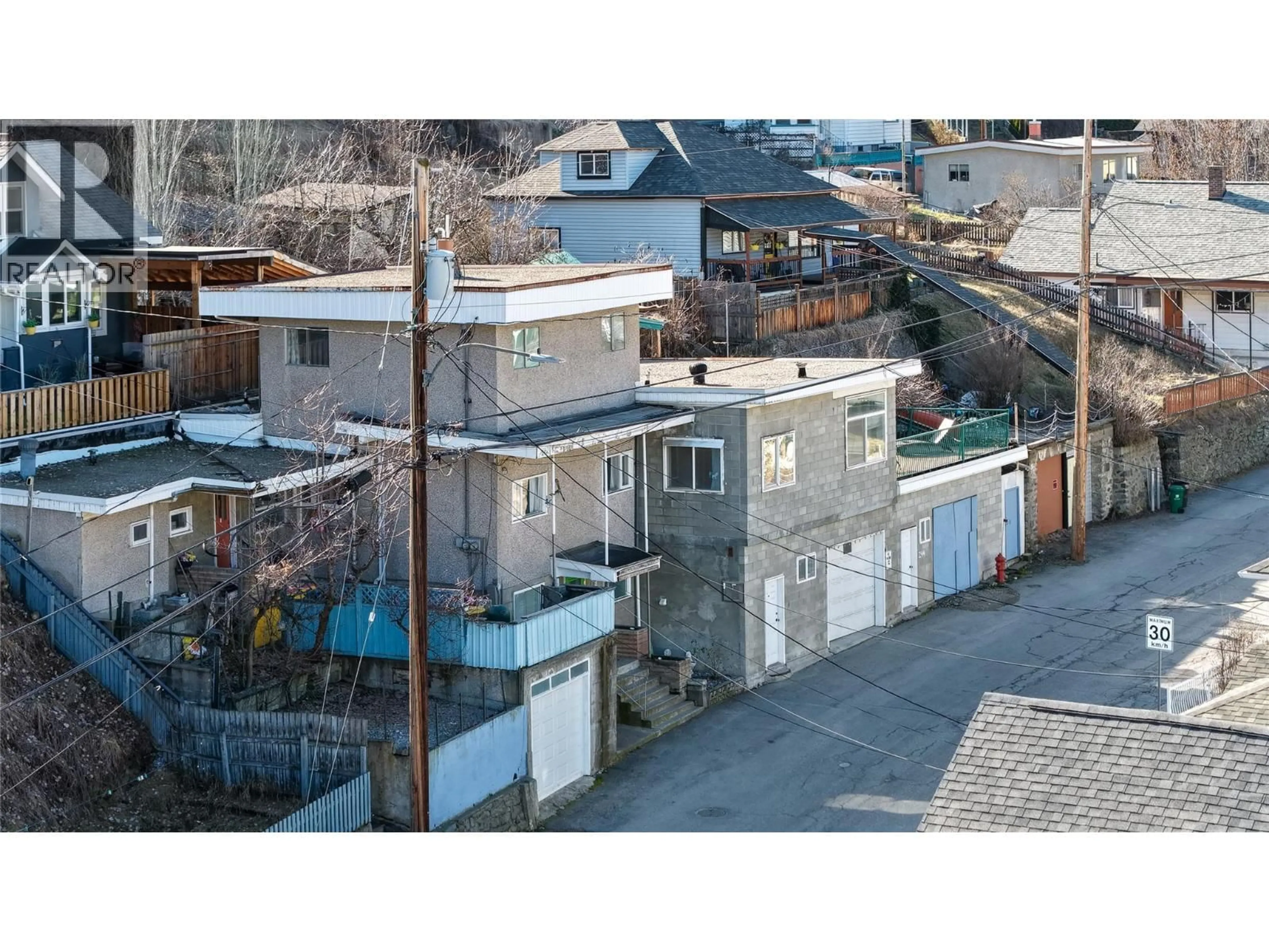 A pic from outside/outdoor area/front of a property/back of a property/a pic from drone, street for 244A OLD ROSSLAND AVENUE, Trail British Columbia V1R3M7