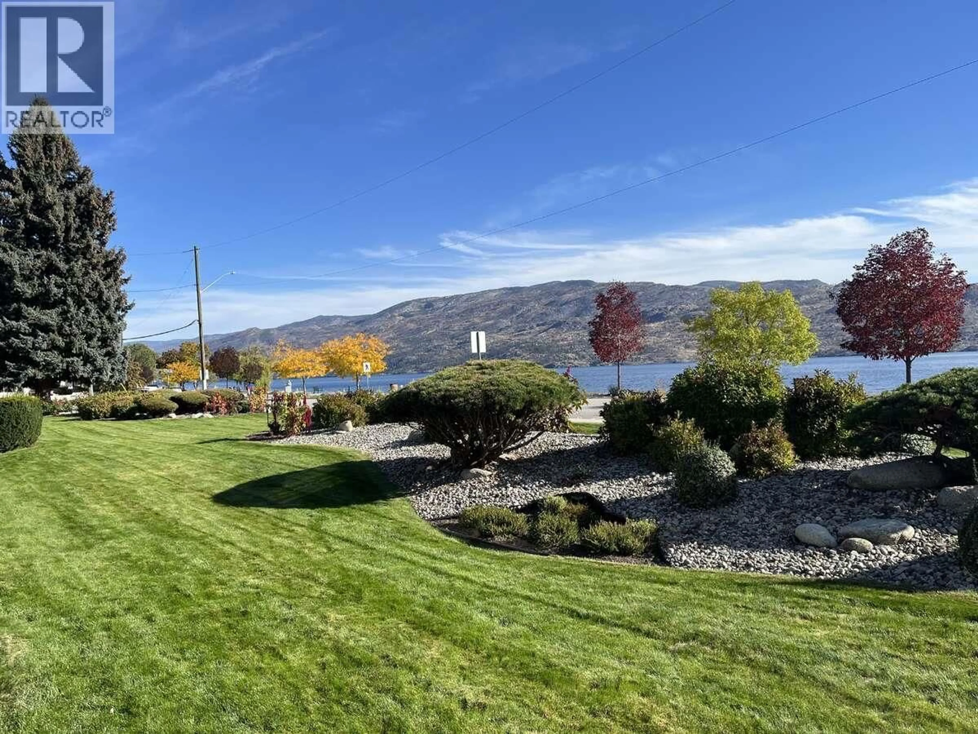 A pic from outside/outdoor area/front of a property/back of a property/a pic from drone, water/lake/river/ocean view for 106 - 4340 BEACH AVENUE, Peachland British Columbia V0H1X6