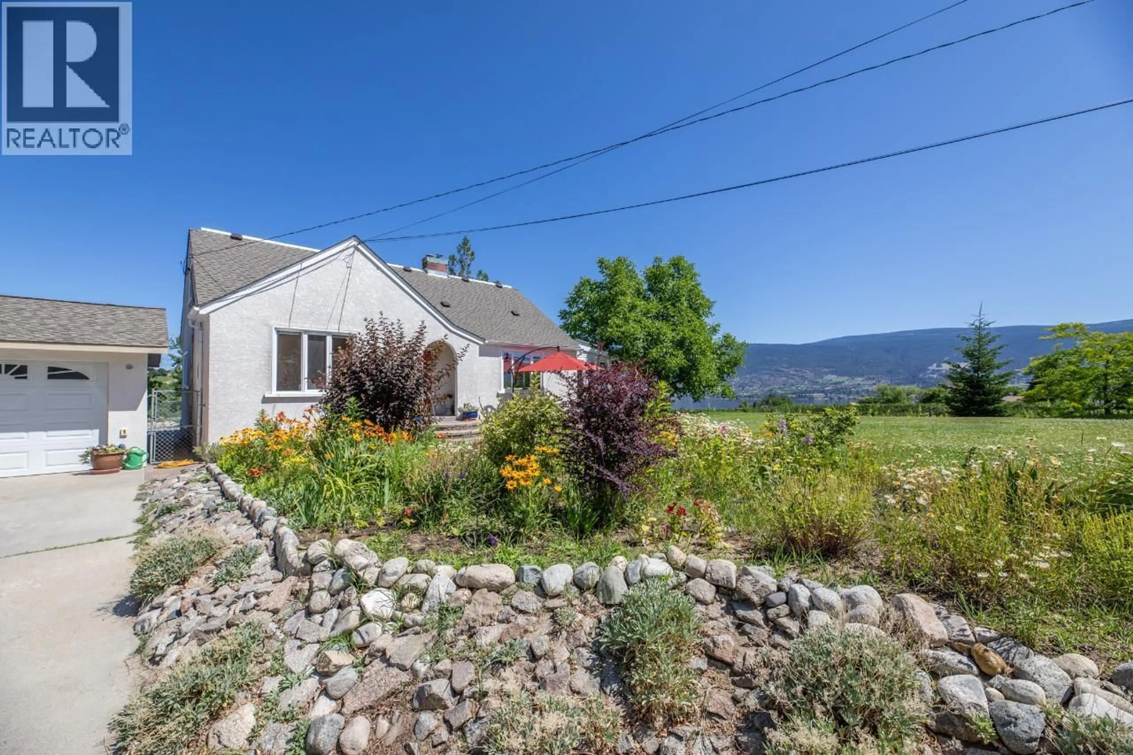 A pic from outside/outdoor area/front of a property/back of a property/a pic from drone, mountain view for 4910 GARTRELL ROAD, Summerland British Columbia V0H1Z4
