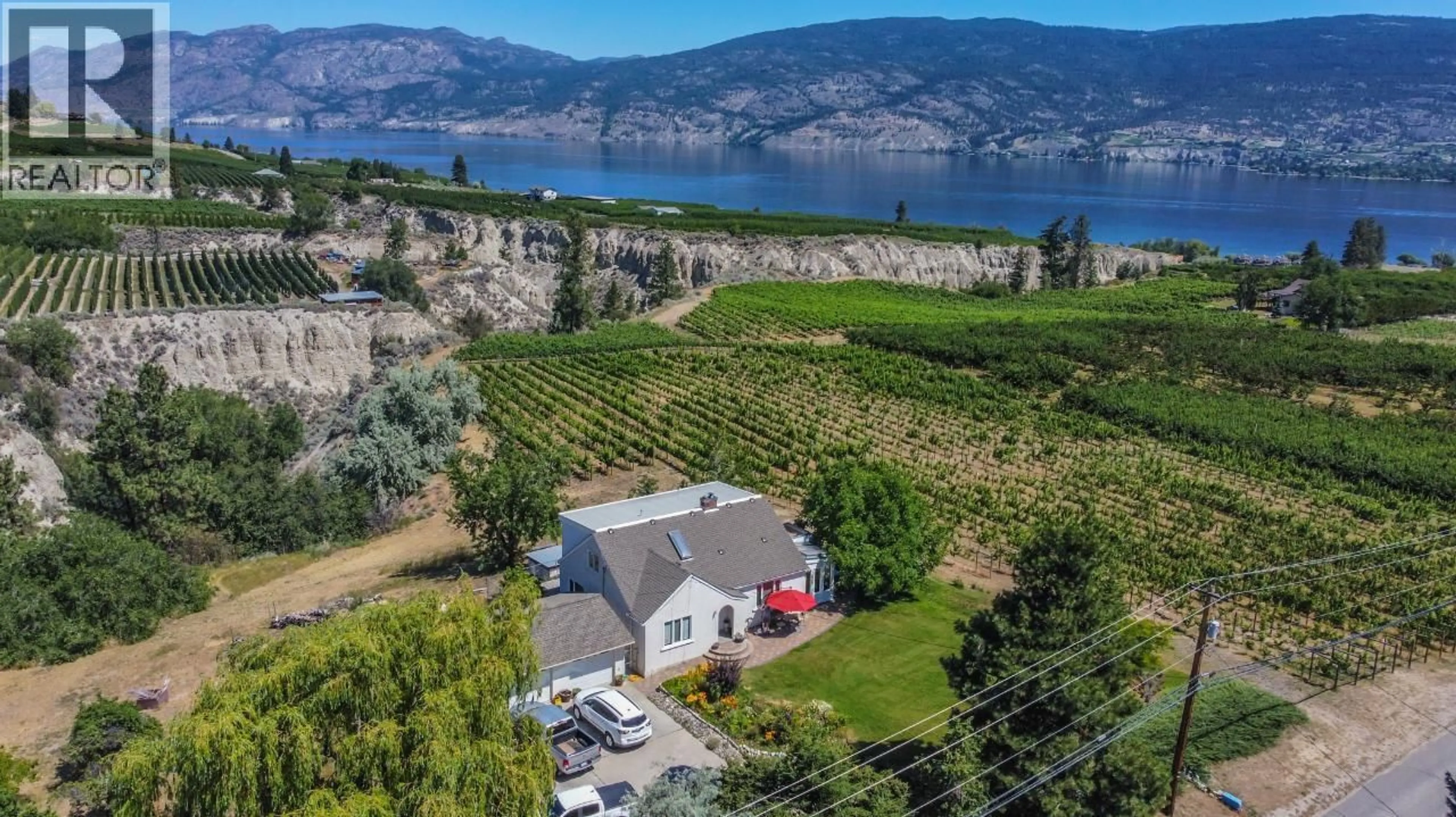 A pic from outside/outdoor area/front of a property/back of a property/a pic from drone, water/lake/river/ocean view for 4910 GARTRELL ROAD, Summerland British Columbia V0H1Z4