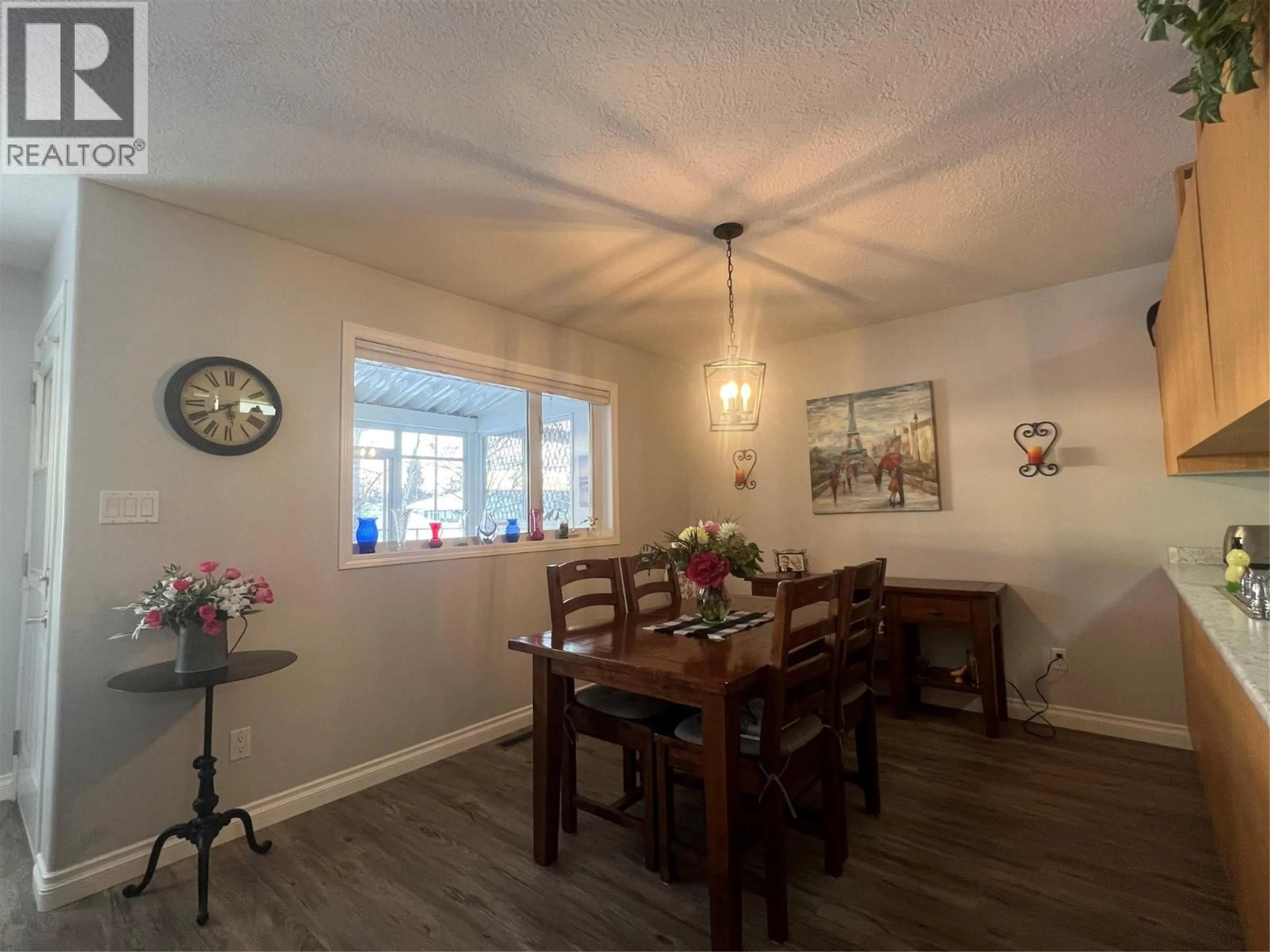 Dining room, wood/laminate floor for 215 - 10805 13 STREET, Dawson Creek British Columbia V1G4E5