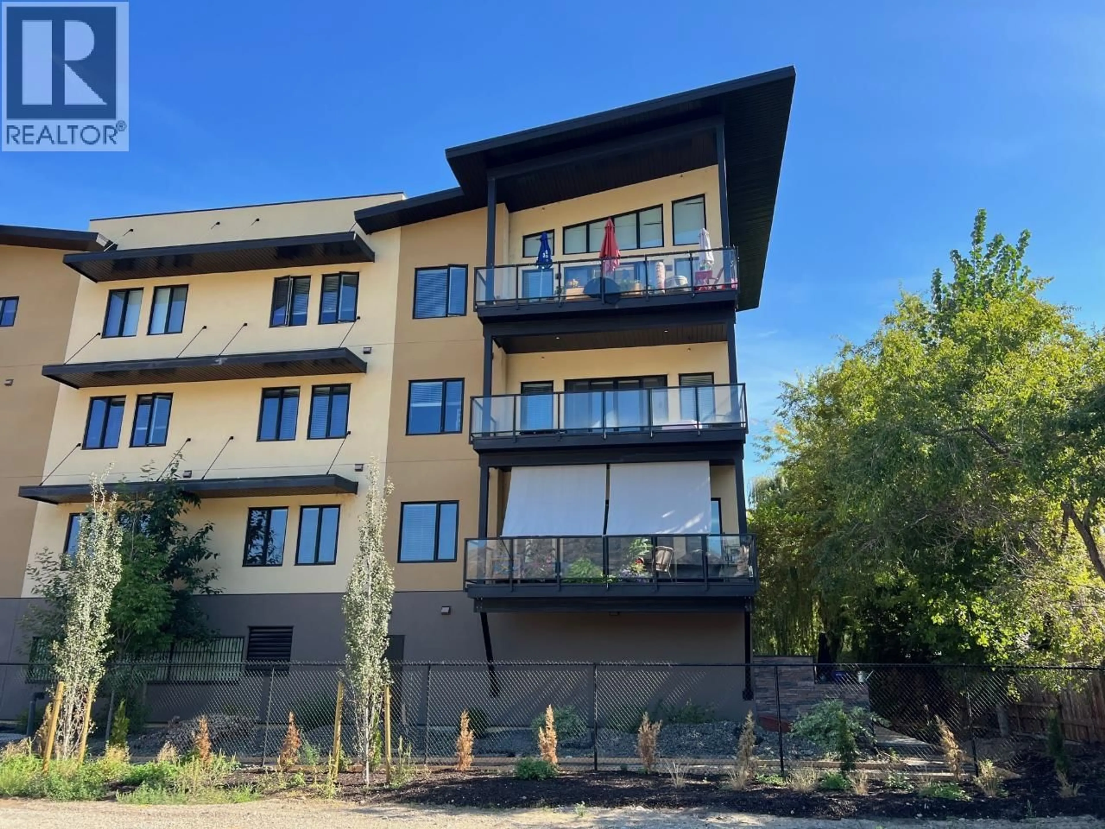 A pic from outside/outdoor area/front of a property/back of a property/a pic from drone, building for 213 - 3313 WILSON STREET, Penticton British Columbia V2A8J3
