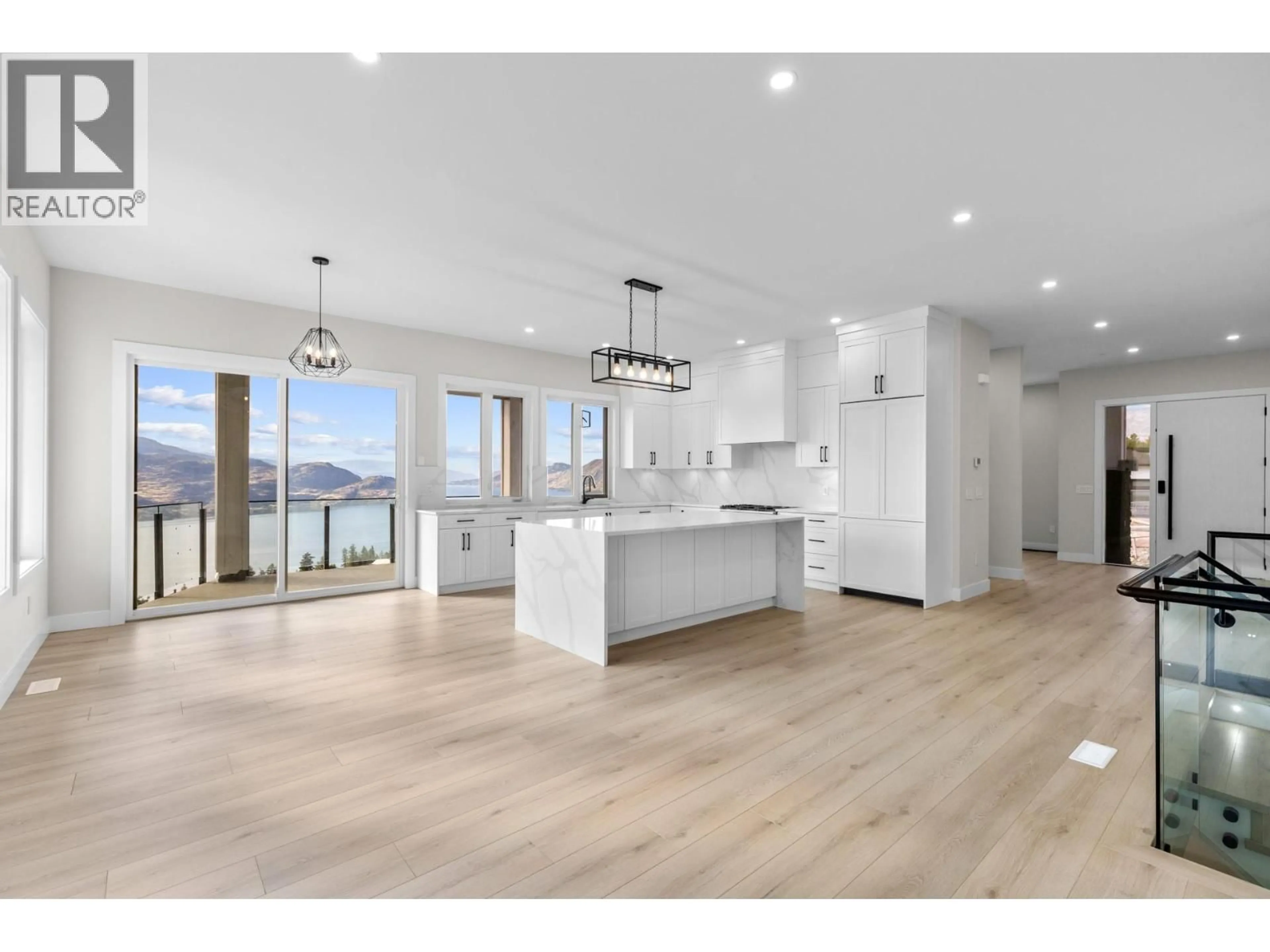 Open concept kitchen, wood/laminate floor for 6052 GERRIE ROAD, Peachland British Columbia V0H1X4