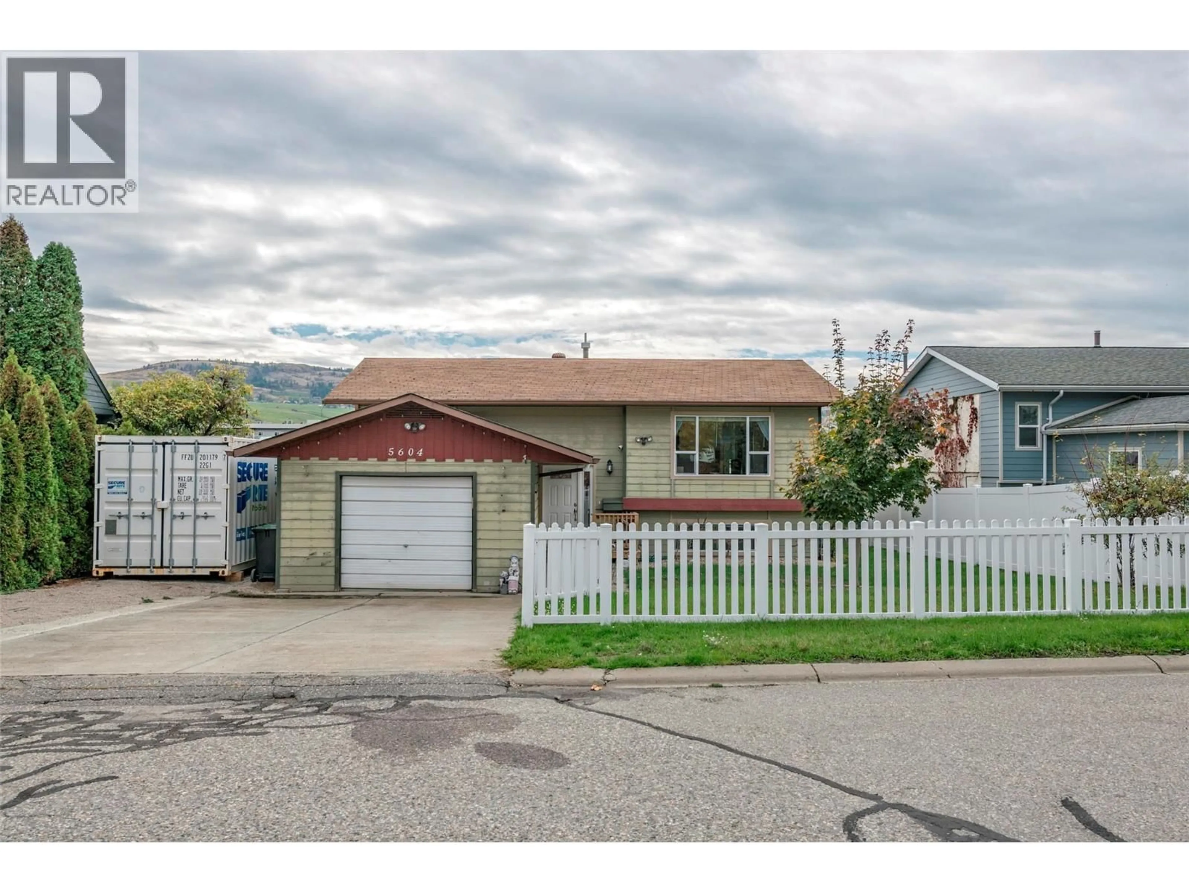 Home with vinyl exterior material, street for 5604 ALLENBY CRESCENT, Vernon British Columbia V1T8P8