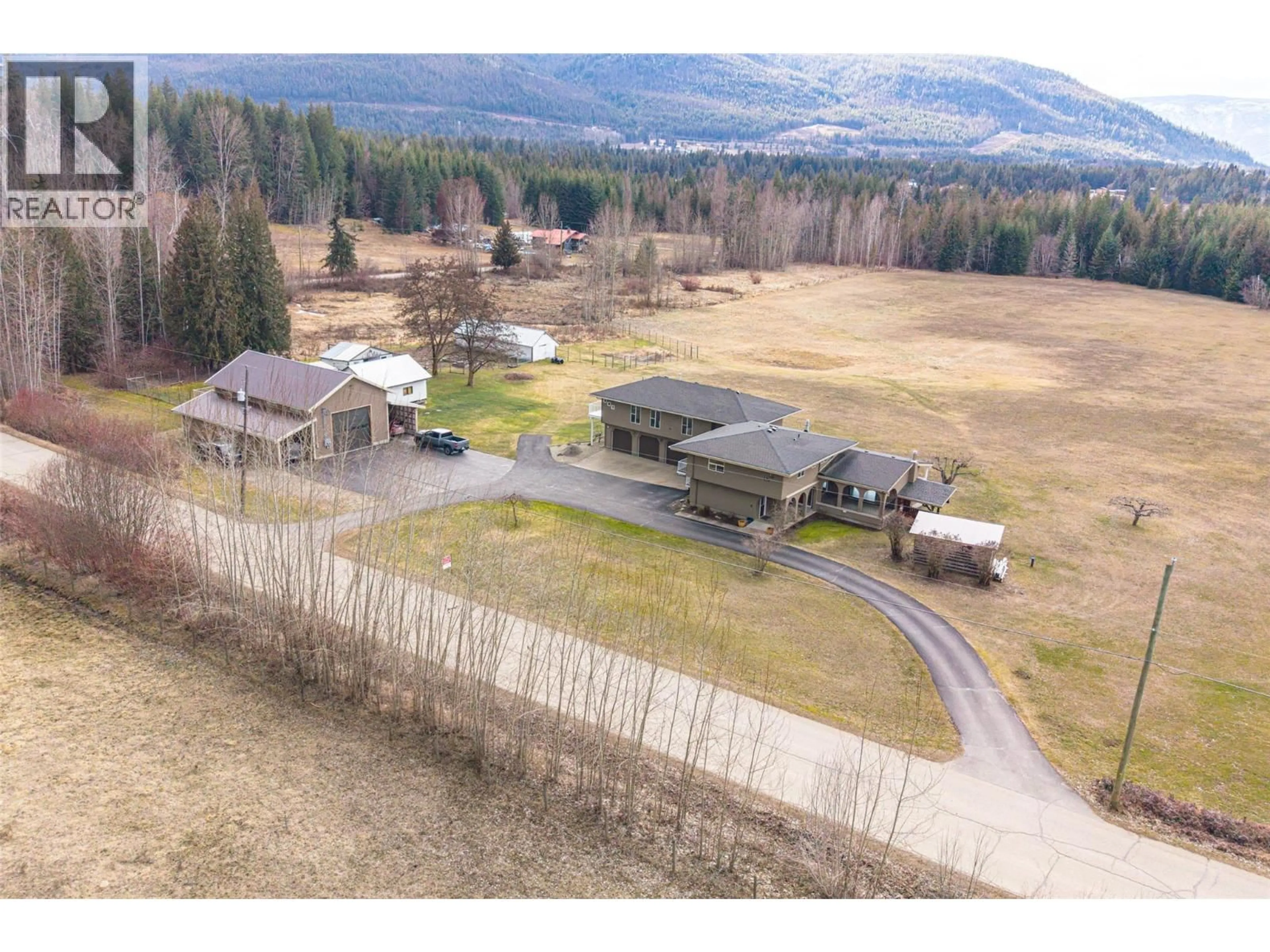 A pic from outside/outdoor area/front of a property/back of a property/a pic from drone, mountain view for 1851 70 STREET SOUTHEAST, Salmon Arm British Columbia V1E1X4