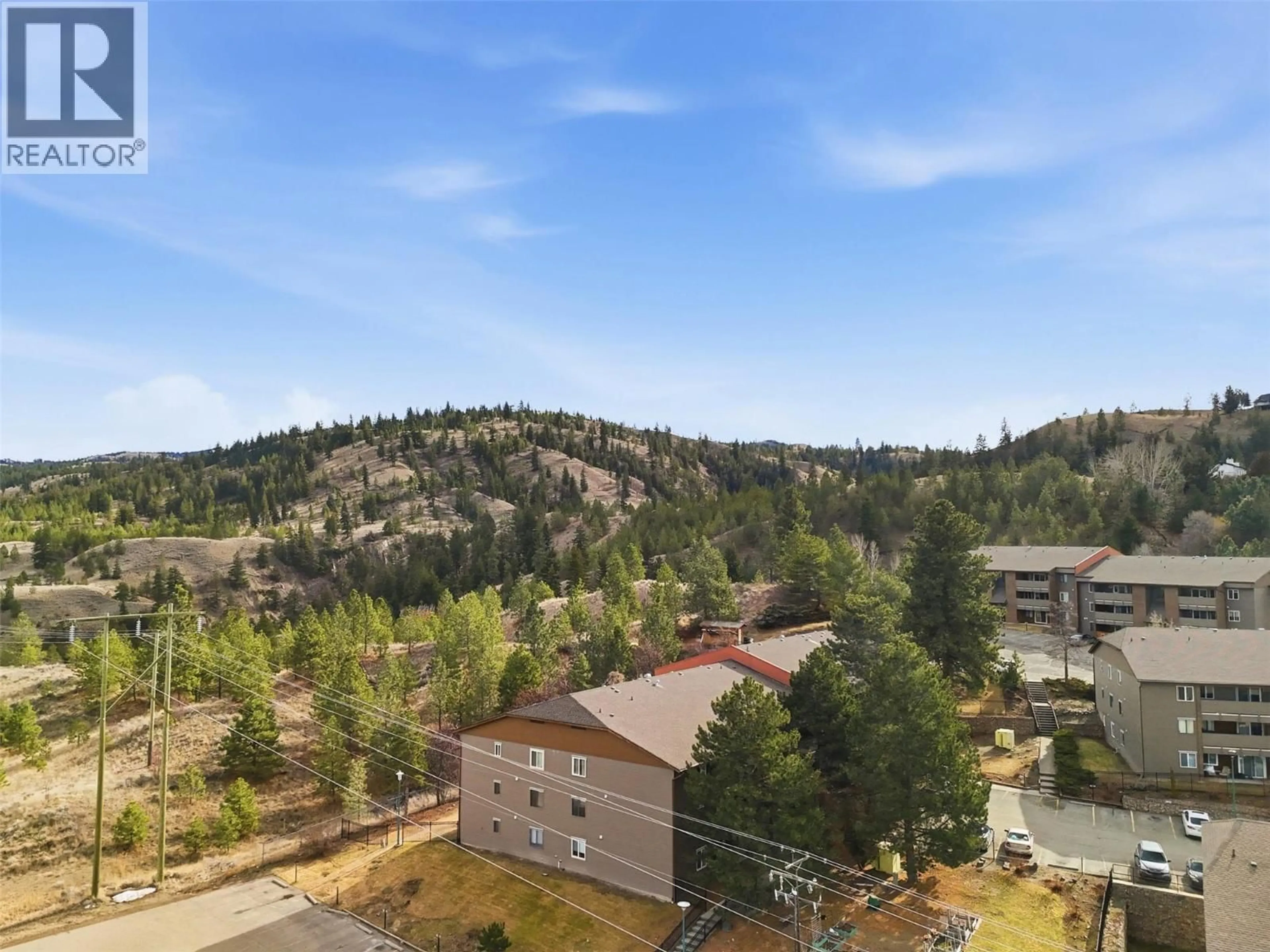 A pic from outside/outdoor area/front of a property/back of a property/a pic from drone, forest/trees view for 306 - 44 WHITESHIELD CRESCENT SOUTH, Kamloops British Columbia V2E2J1