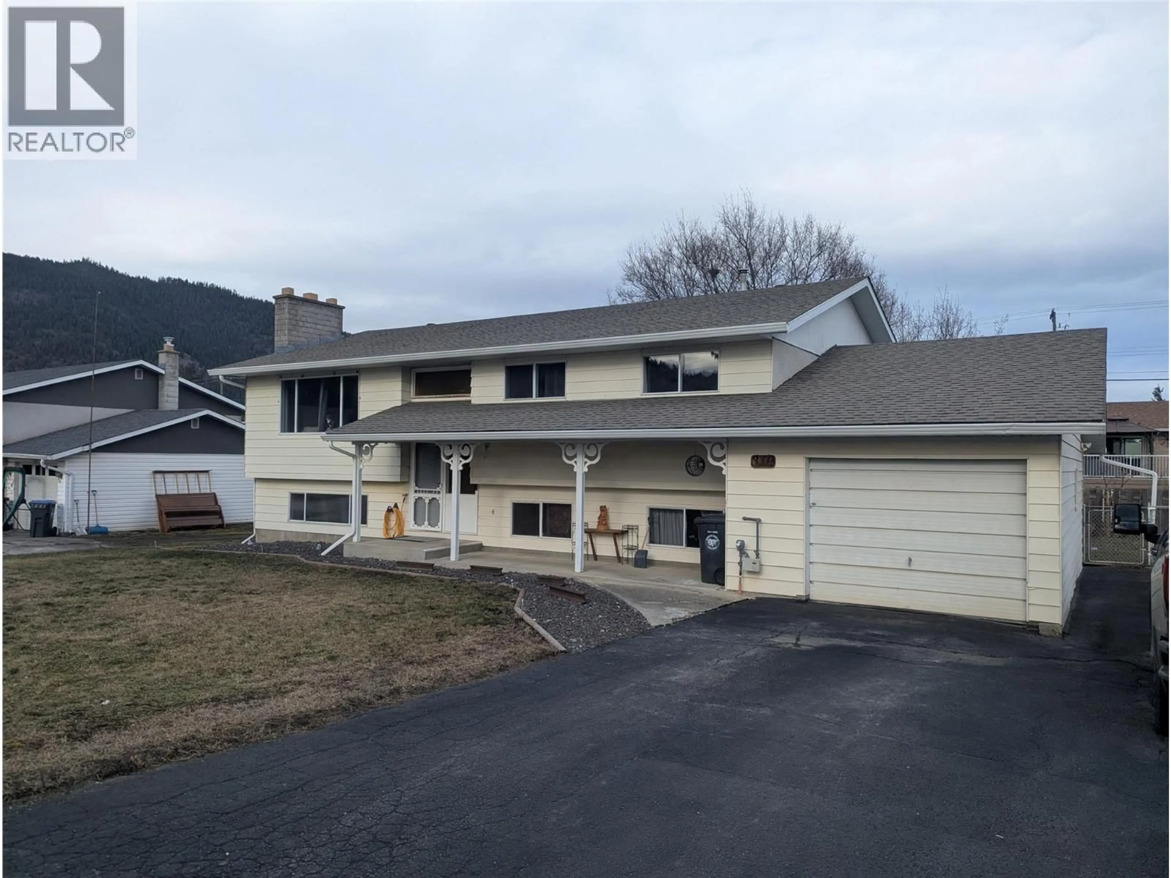 Home with vinyl exterior material, mountain view for 319 LARCH STREET, Chase British Columbia V0E1M1