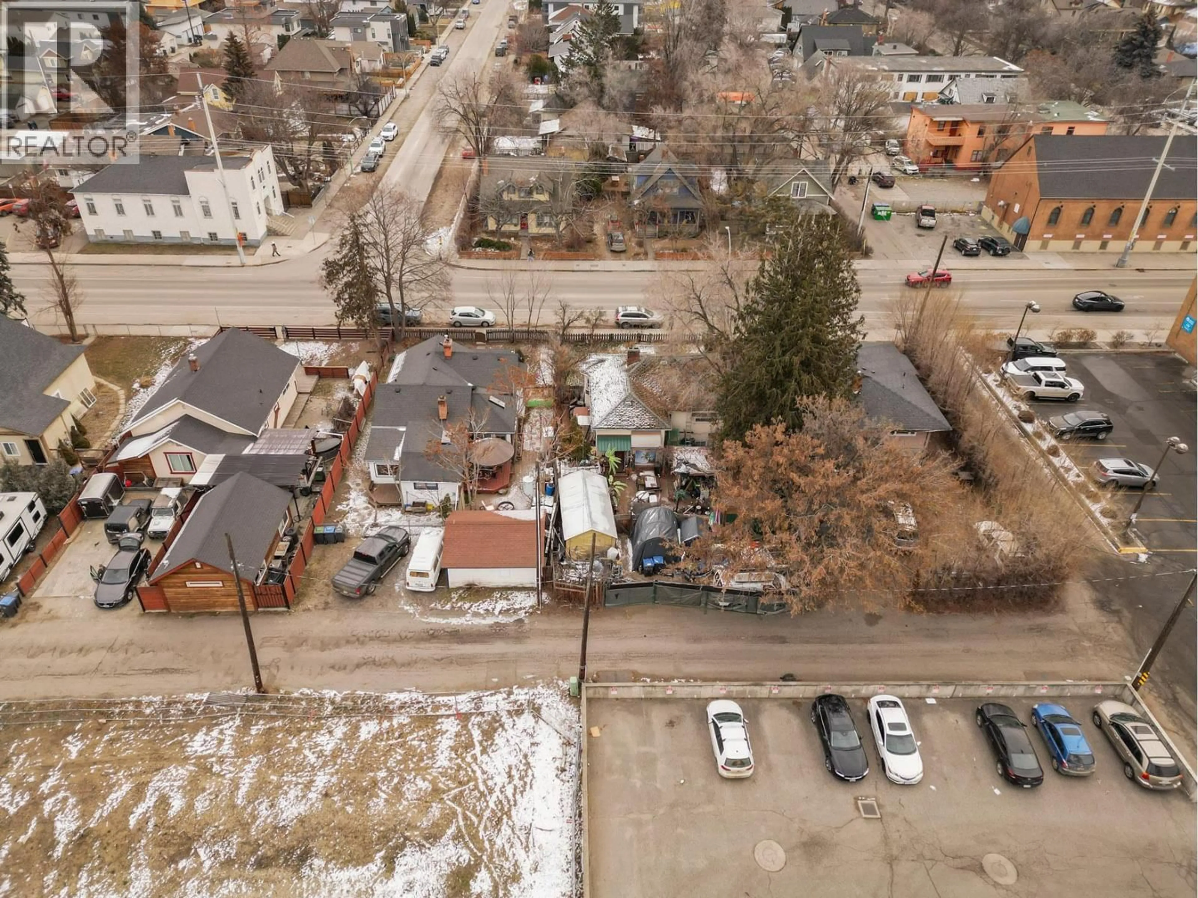 A pic from outside/outdoor area/front of a property/back of a property/a pic from drone, street for 1470 RICHTER STREET, Kelowna British Columbia V1Y2L8