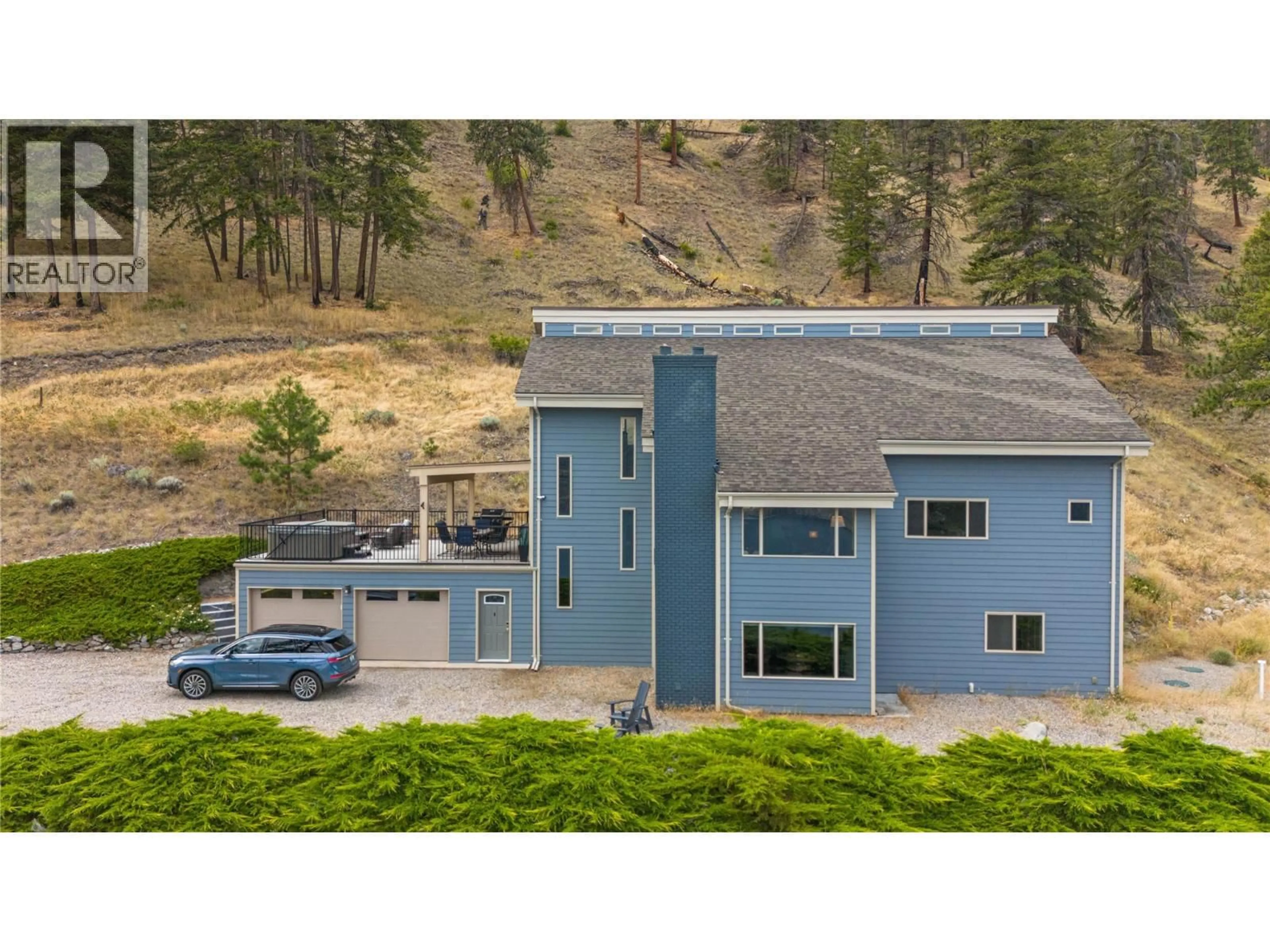 A pic from outside/outdoor area/front of a property/back of a property/a pic from drone, mountain view for 432 HWY 97 HIGHWAY, Summerland British Columbia V0H1Z6