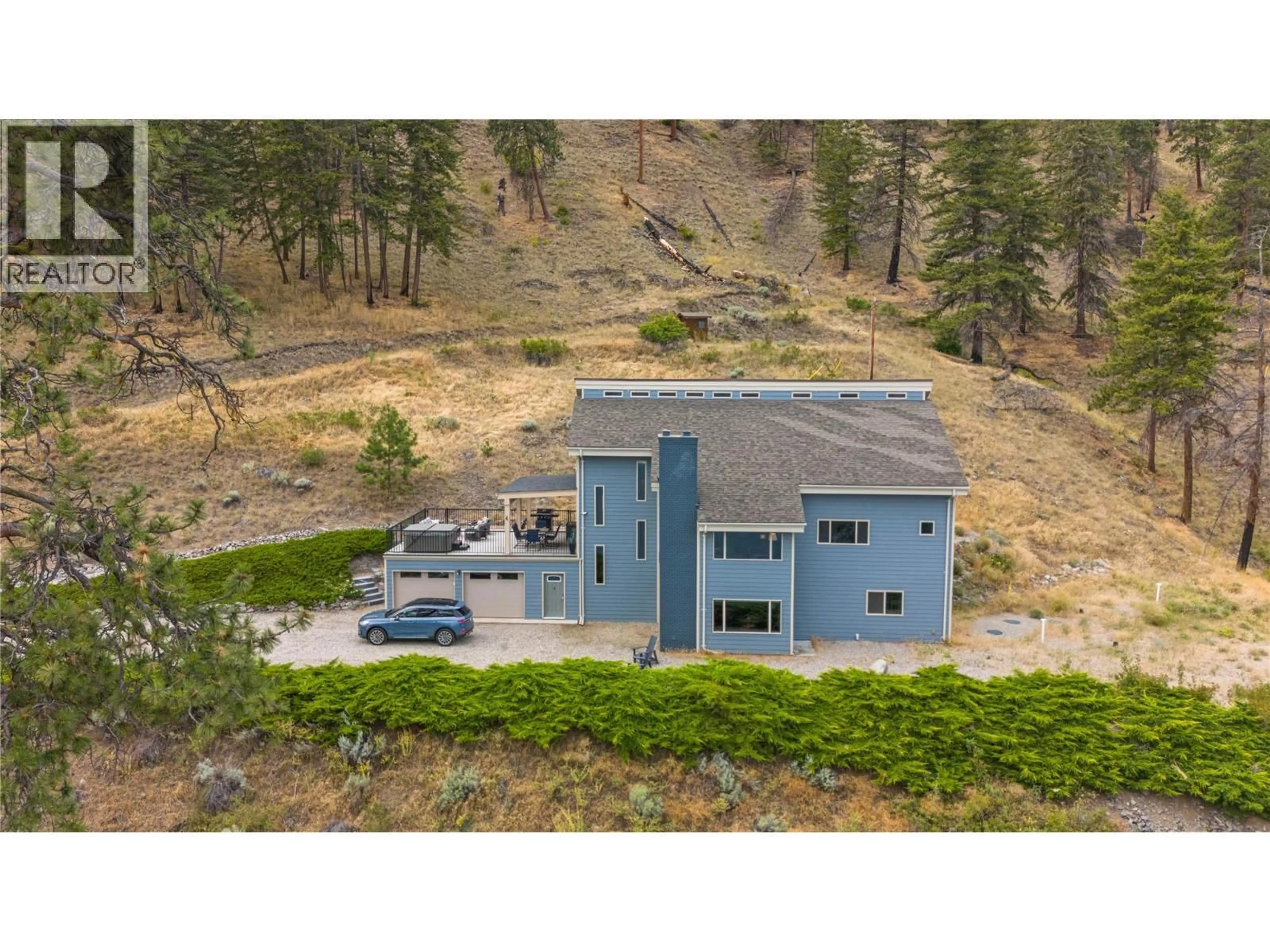 A pic from outside/outdoor area/front of a property/back of a property/a pic from drone, unknown for 432 HWY 97 HIGHWAY, Summerland British Columbia V0H1Z6