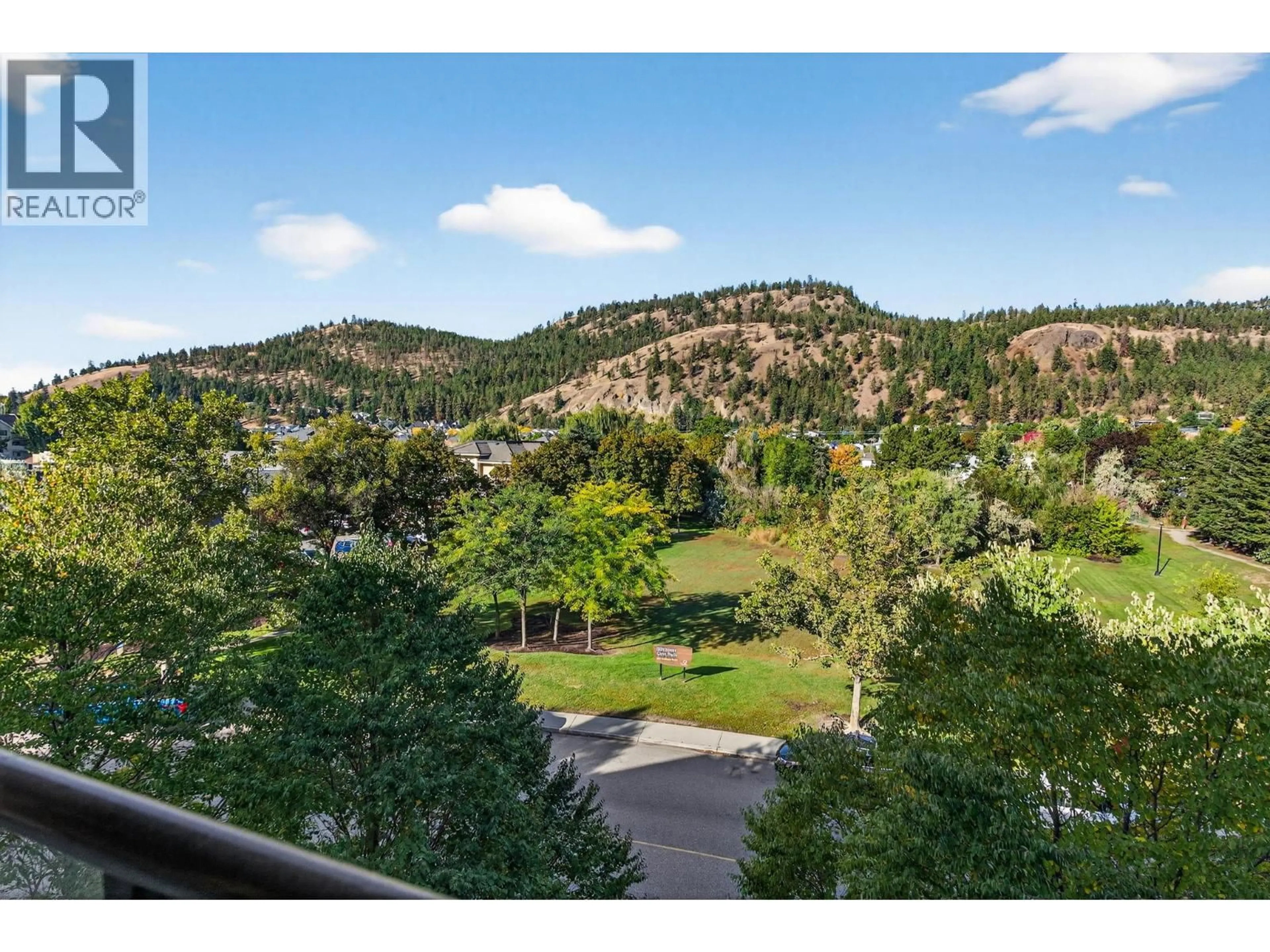 A pic from outside/outdoor area/front of a property/back of a property/a pic from drone, mountain view for 406 - 303 WHITMAN ROAD, Kelowna British Columbia V1V2P3
