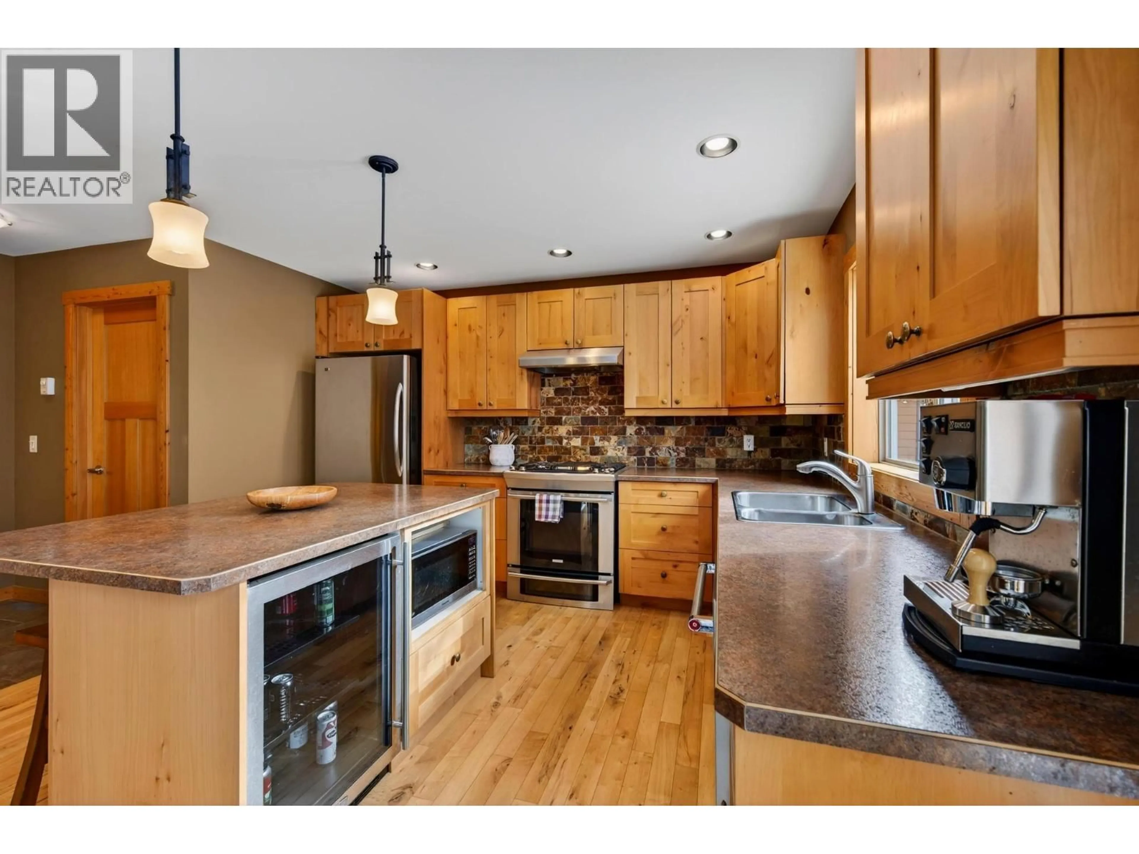 Open concept kitchen, wood/laminate floor for 1417 GRANITE DRIVE, Golden British Columbia V0A1H3