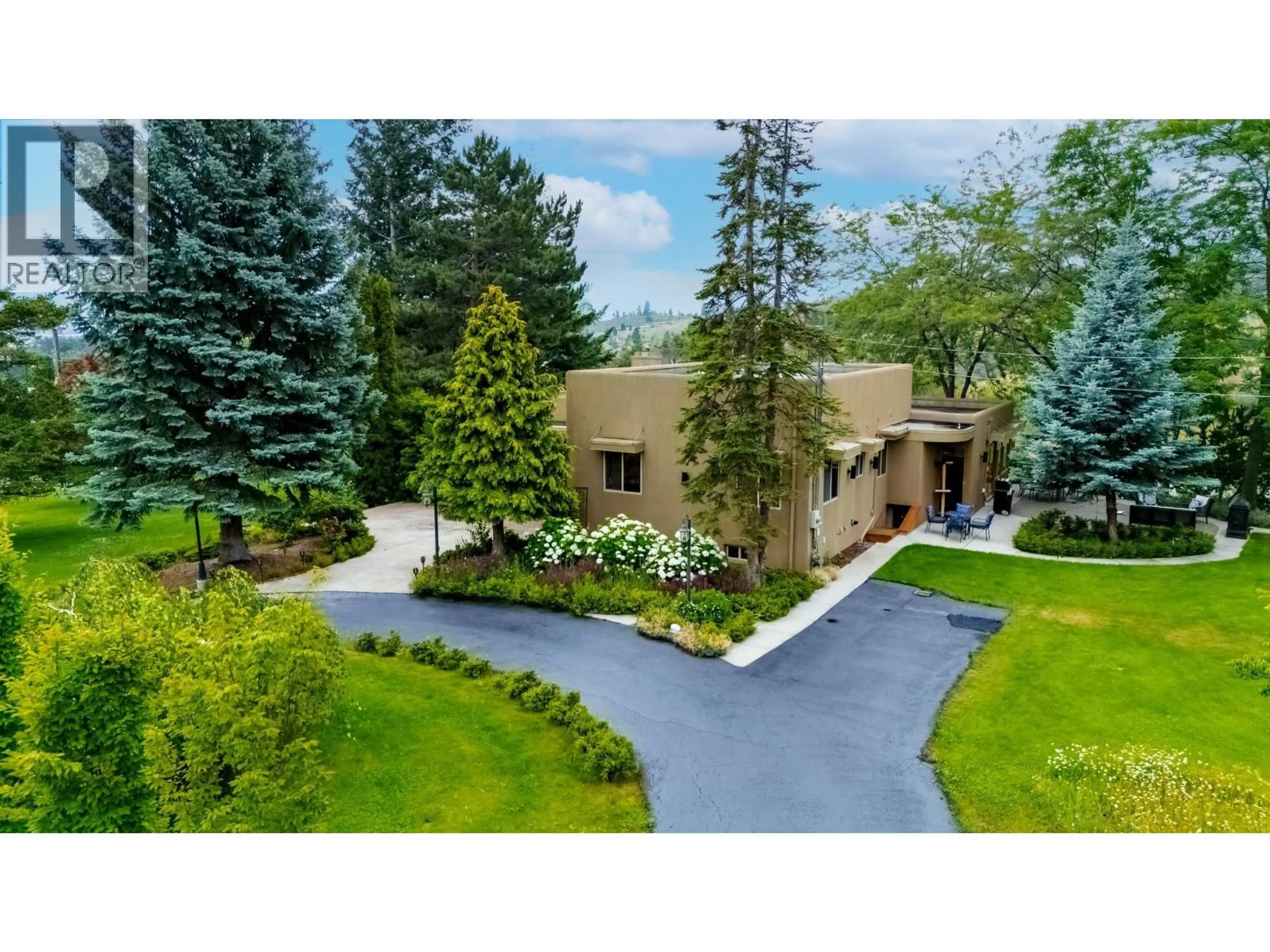 A pic from outside/outdoor area/front of a property/back of a property/a pic from drone, unknown for 119 SUNGLO DRIVE, Penticton British Columbia V2A8X6