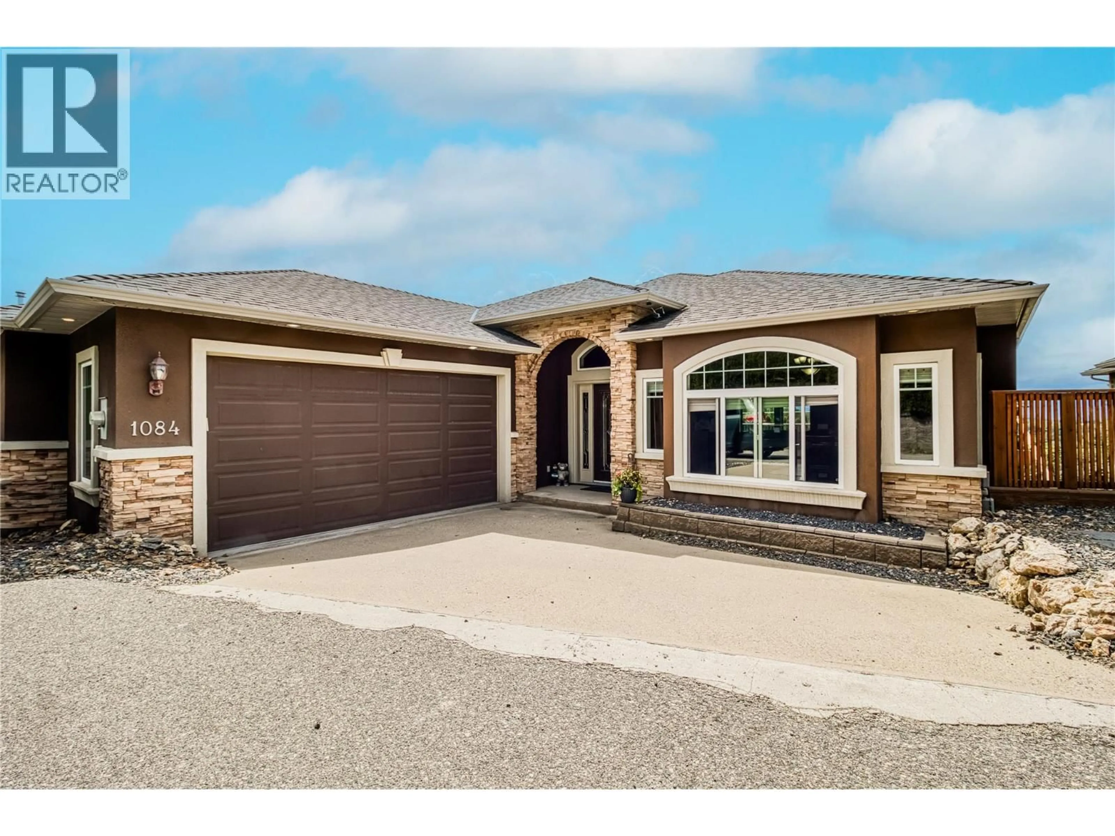 Home with brick exterior material, street for 1084 HUME AVENUE, Kelowna British Columbia V1P1P2