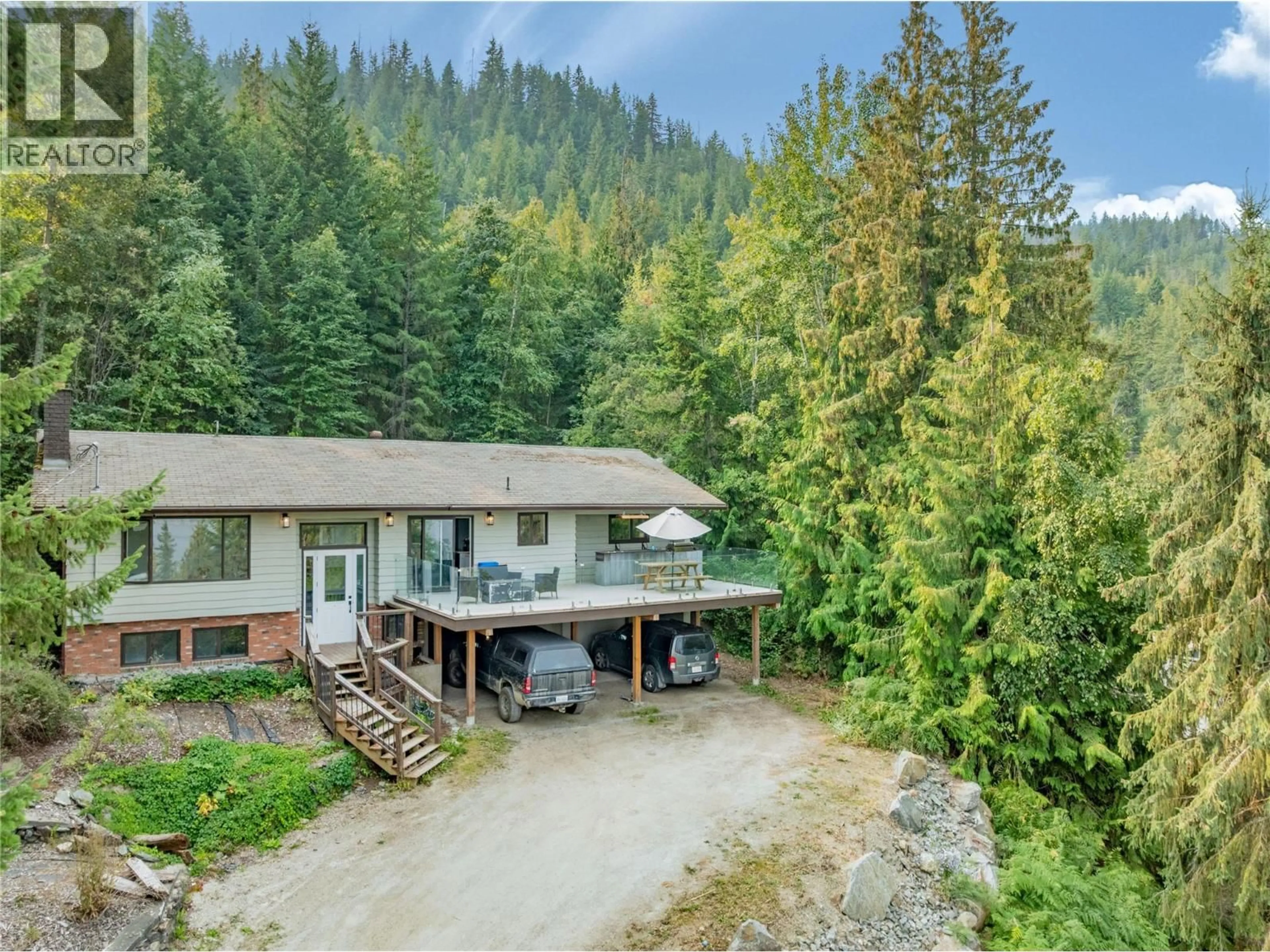 A pic from outside/outdoor area/front of a property/back of a property/a pic from drone, forest/trees view for 4018 GREAVES ROAD, Eagle Bay British Columbia V0E1T0
