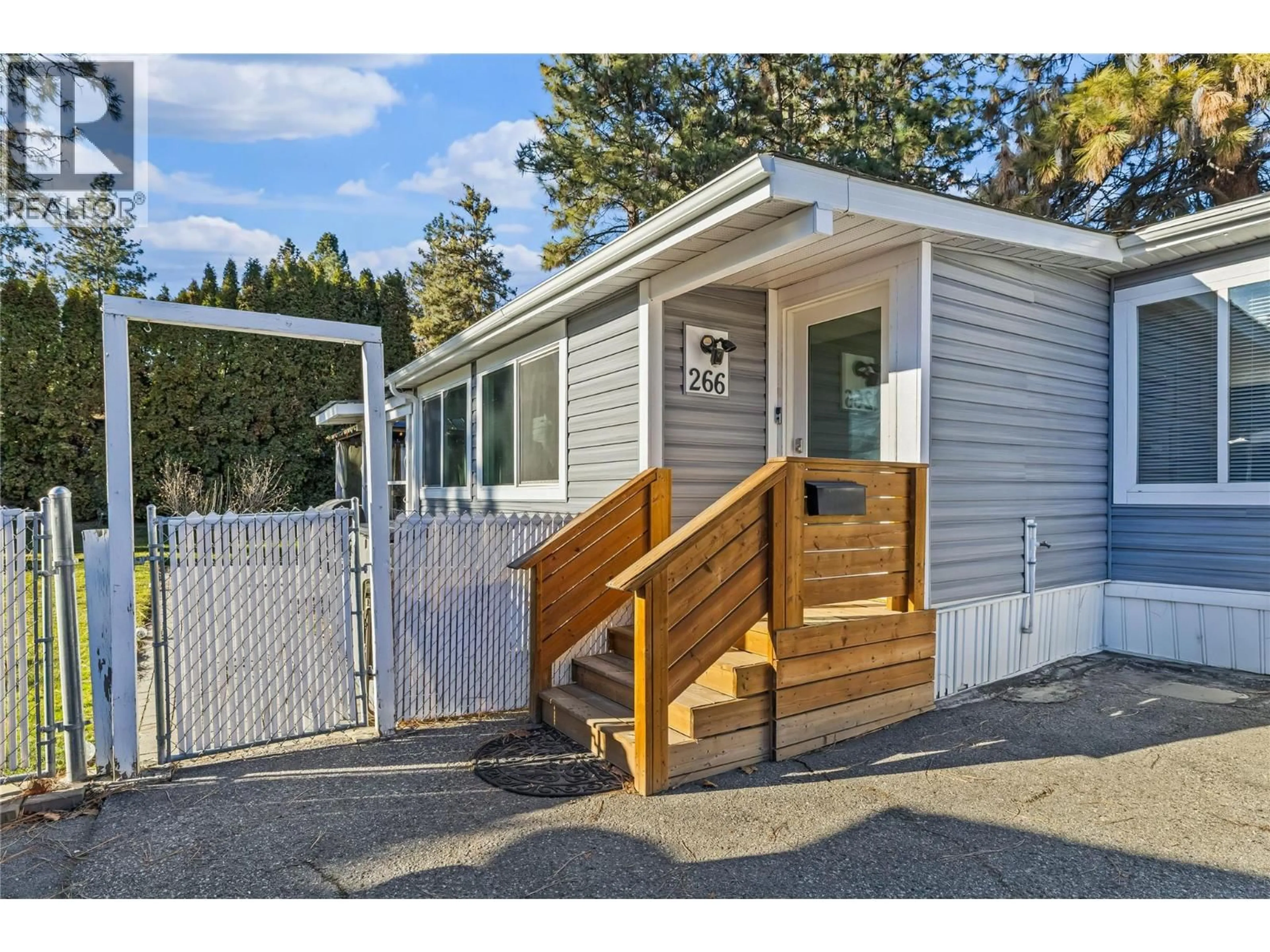 Home with vinyl exterior material, street for 266 - 1999 97 HIGHWAY SOUTH, West Kelowna British Columbia V1Z1B2
