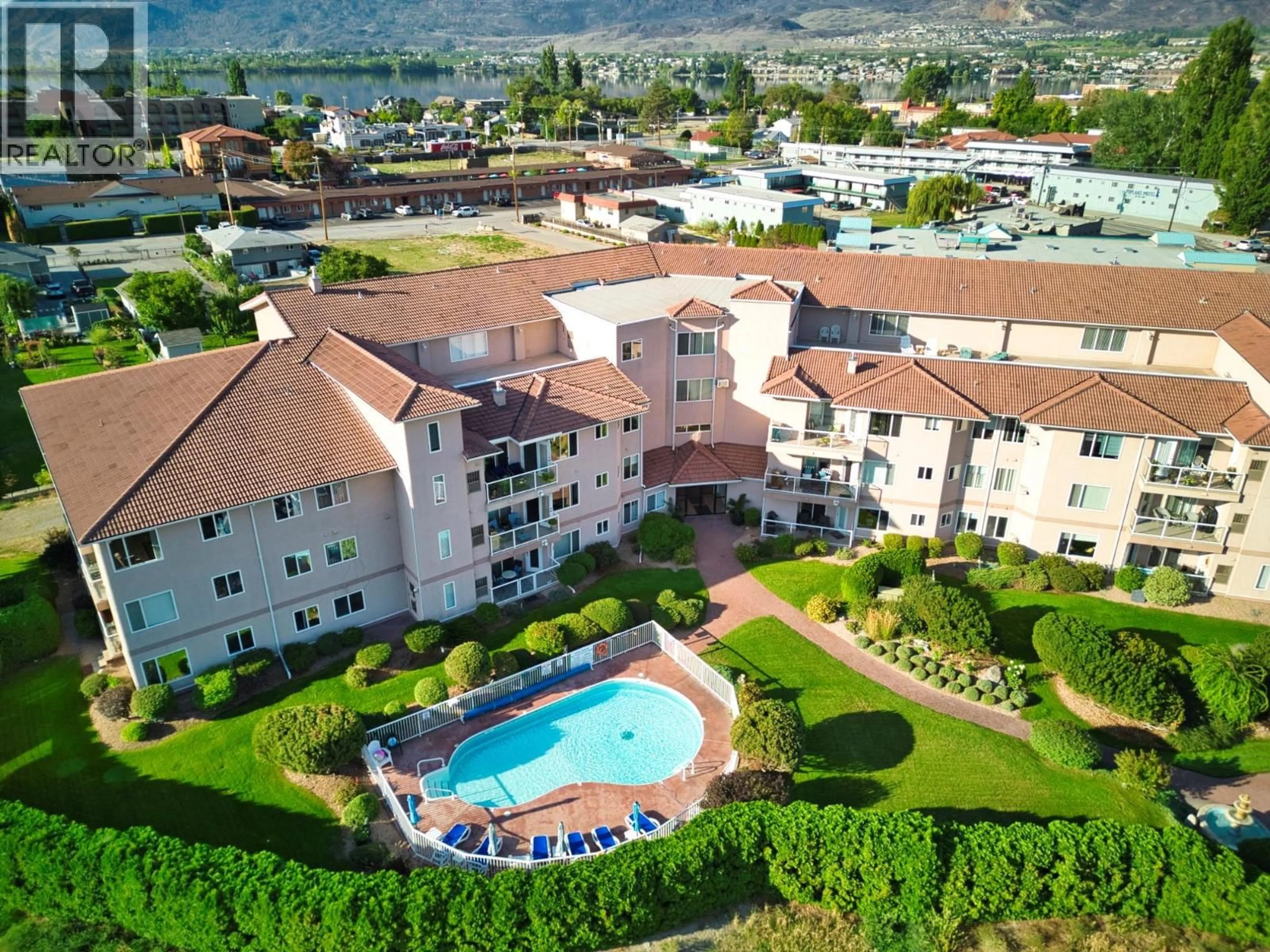 A pic from outside/outdoor area/front of a property/back of a property/a pic from drone, mountain view for 408 - 6805 COTTONWOOD DRIVE, Osoyoos British Columbia V0H1V3