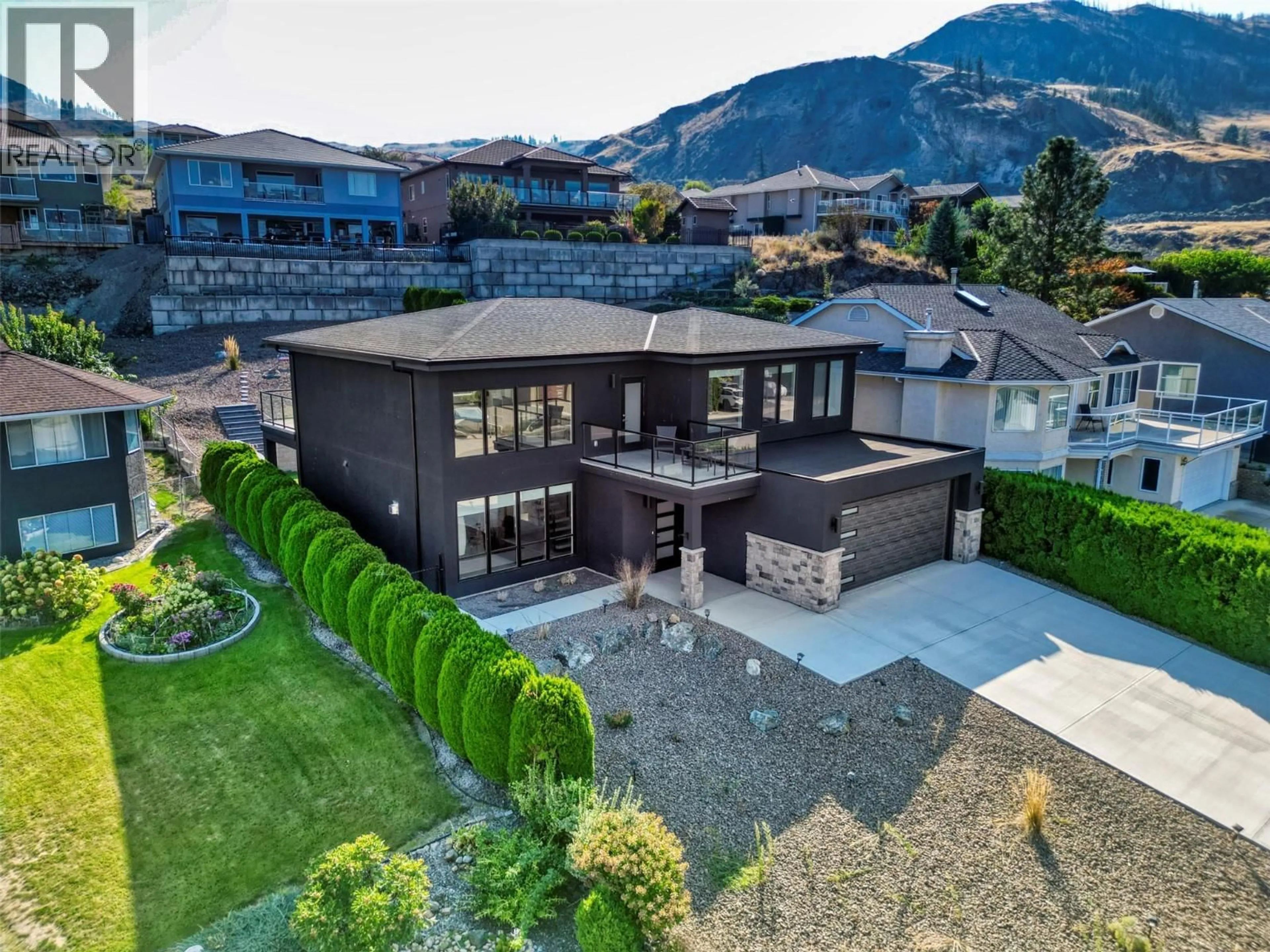 A pic from outside/outdoor area/front of a property/back of a property/a pic from drone, mountain view for 11706 QUAIL RIDGE PLACE, Osoyoos British Columbia V0H1V4