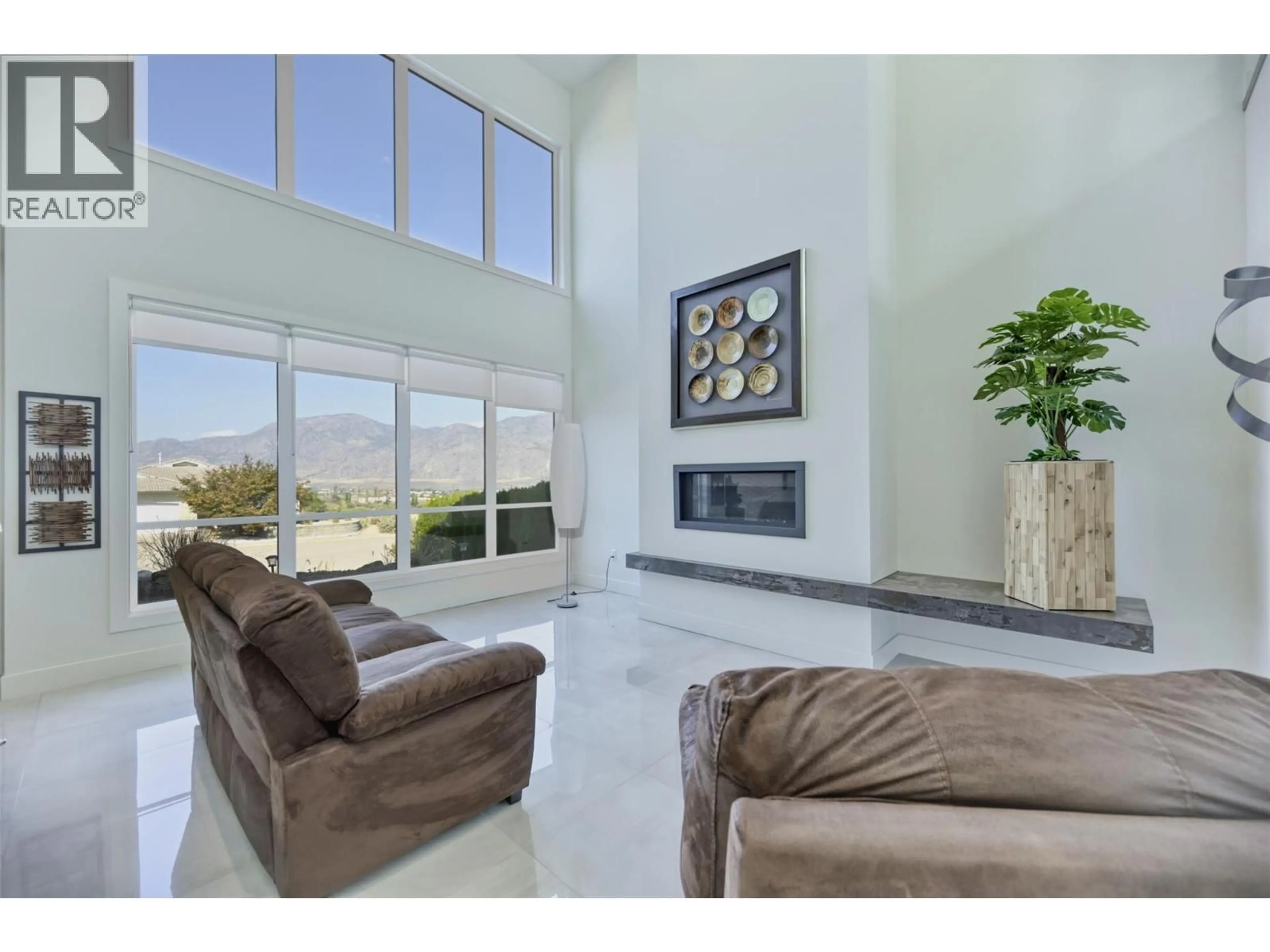 Living room with furniture, ceramic/tile floor for 11706 QUAIL RIDGE PLACE, Osoyoos British Columbia V0H1V4