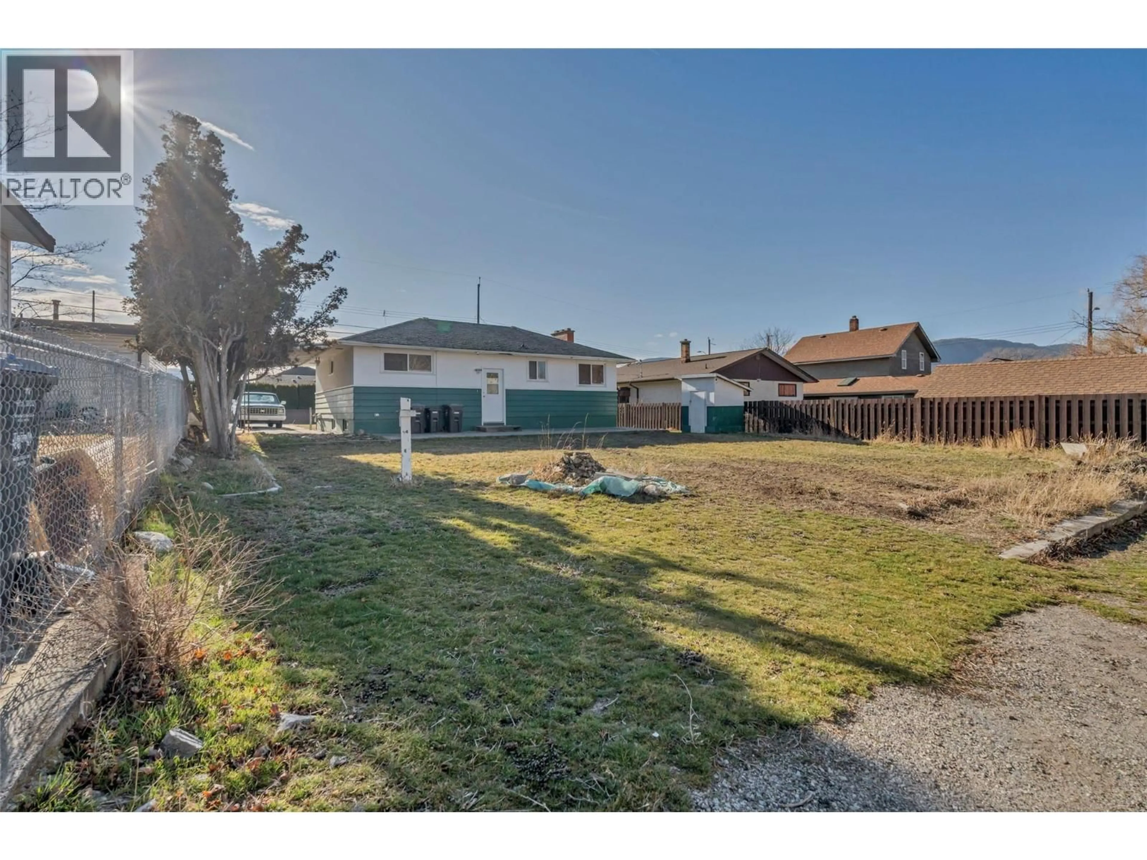 A pic from outside/outdoor area/front of a property/back of a property/a pic from drone, street for 711 NELSON AVENUE, Penticton British Columbia V2A6J7