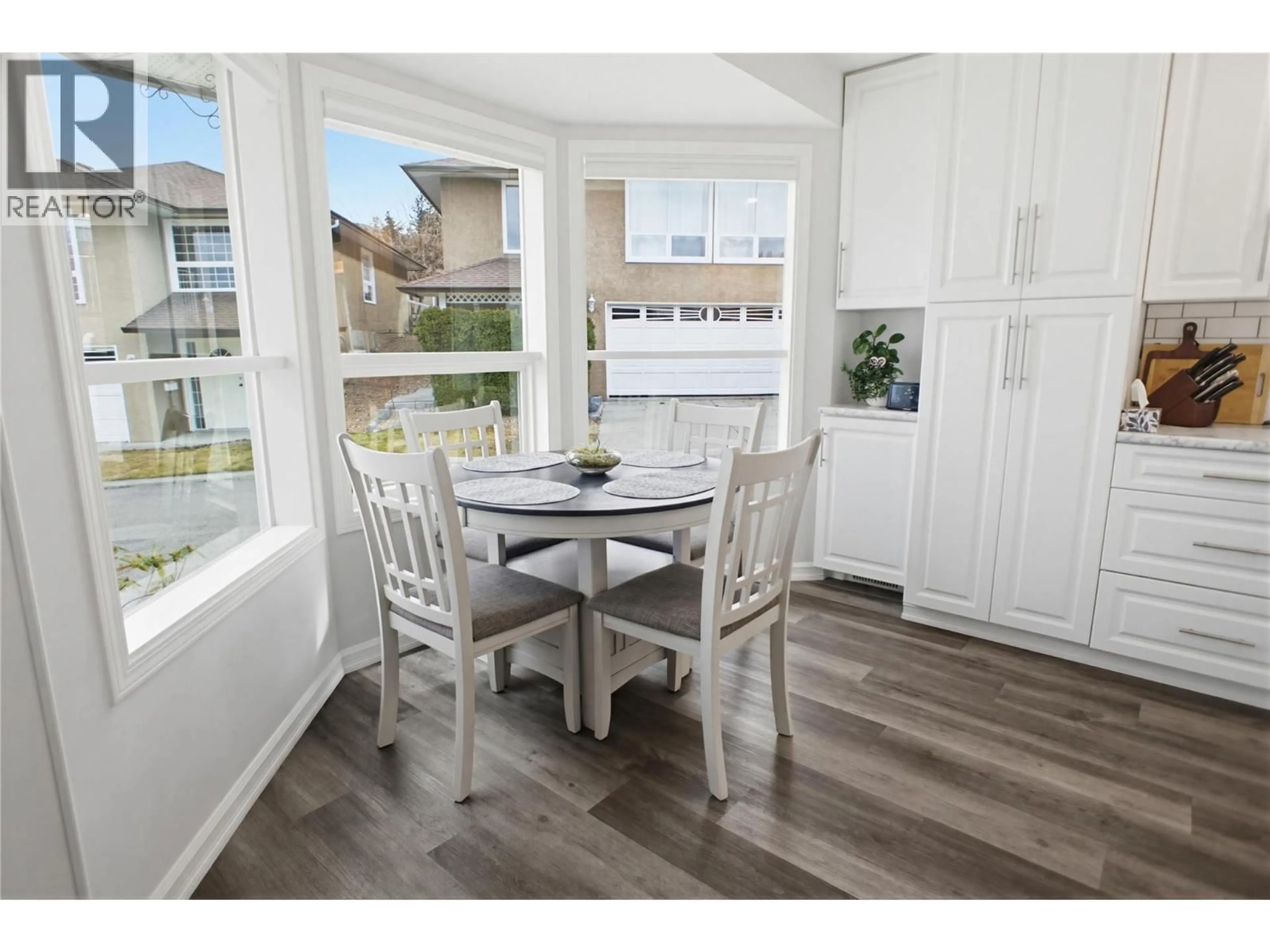 Open concept kitchen, wood/laminate floor for 8 - 2020 VAN HORNE DRIVE, Kamloops British Columbia V1S1G3