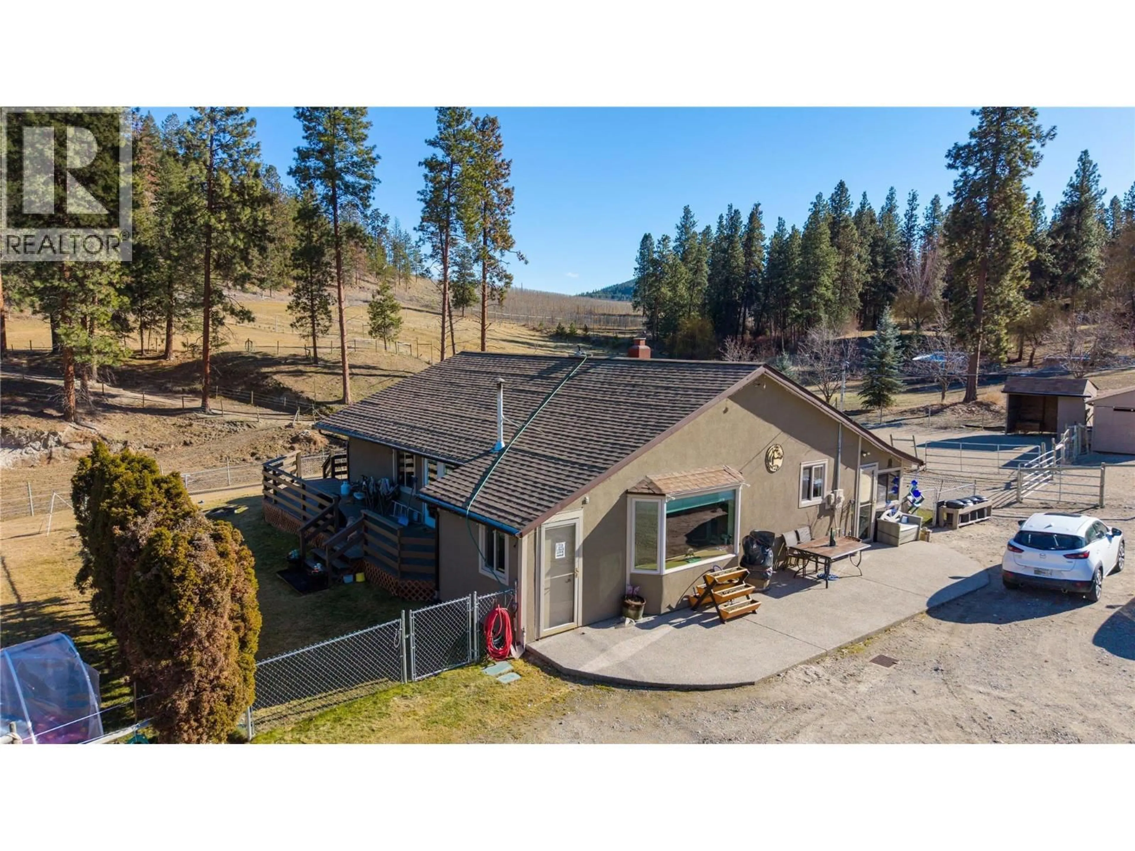 A pic from outside/outdoor area/front of a property/back of a property/a pic from drone, mountain view for 5615 SIMPSON ROAD, Summerland British Columbia V0H1Z2