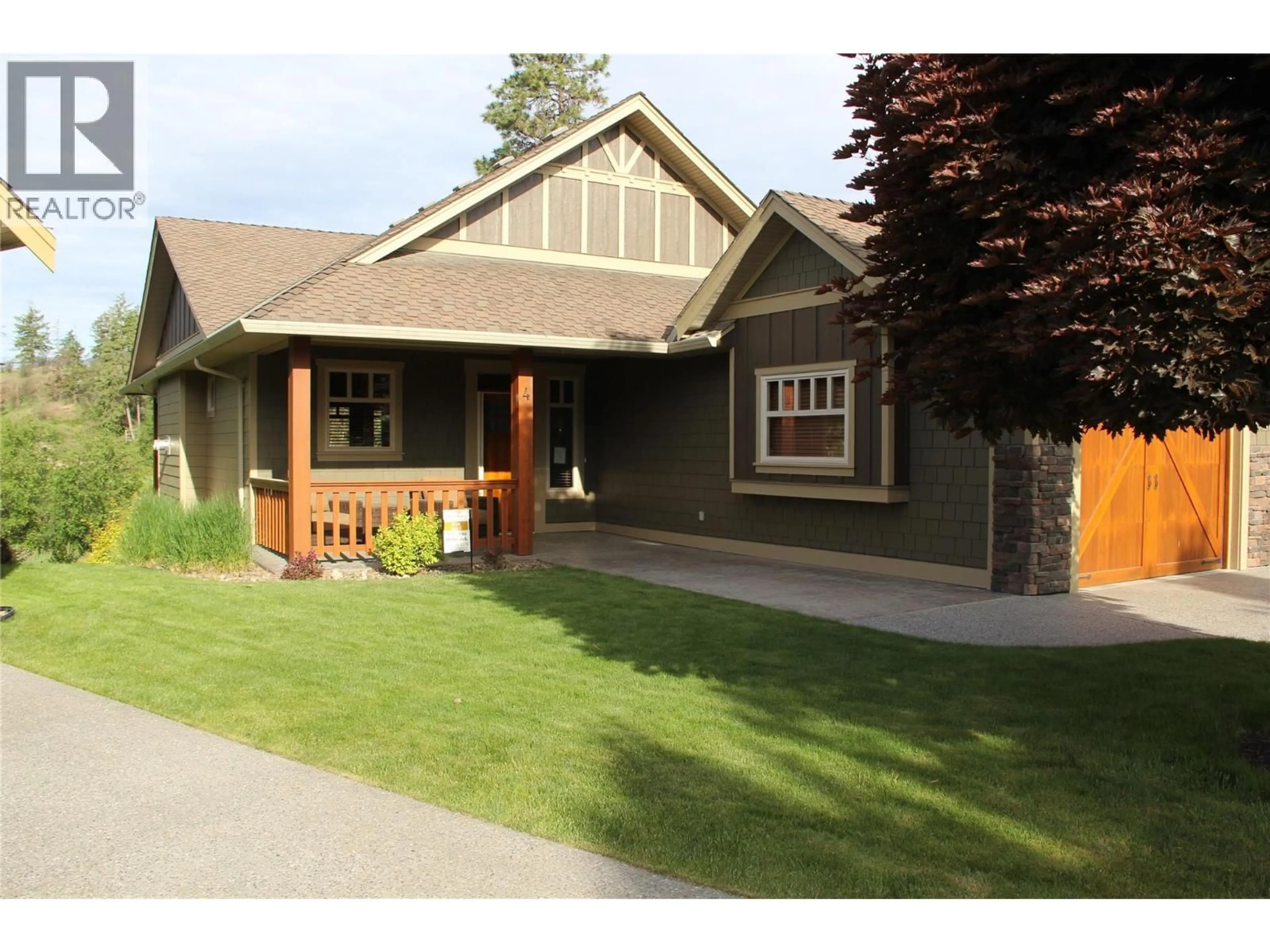 Home with vinyl exterior material, street for 4 - 27 BIRDIE LAKE DRIVE, Vernon British Columbia V1H2J4