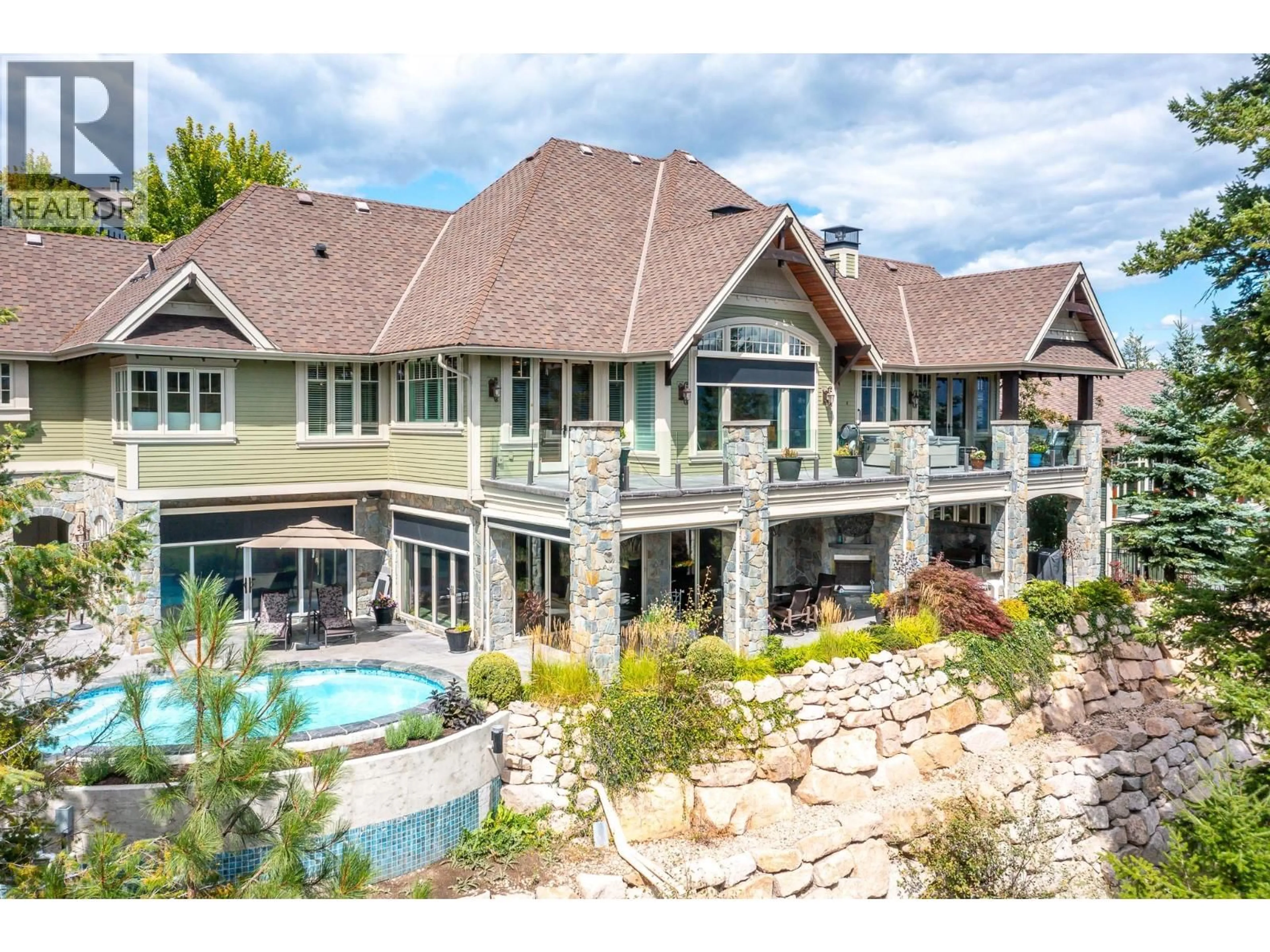 A pic from outside/outdoor area/front of a property/back of a property/a pic from drone, water/lake/river/ocean view for 602 FALCON POINT WAY, Vernon British Columbia V1H2H7