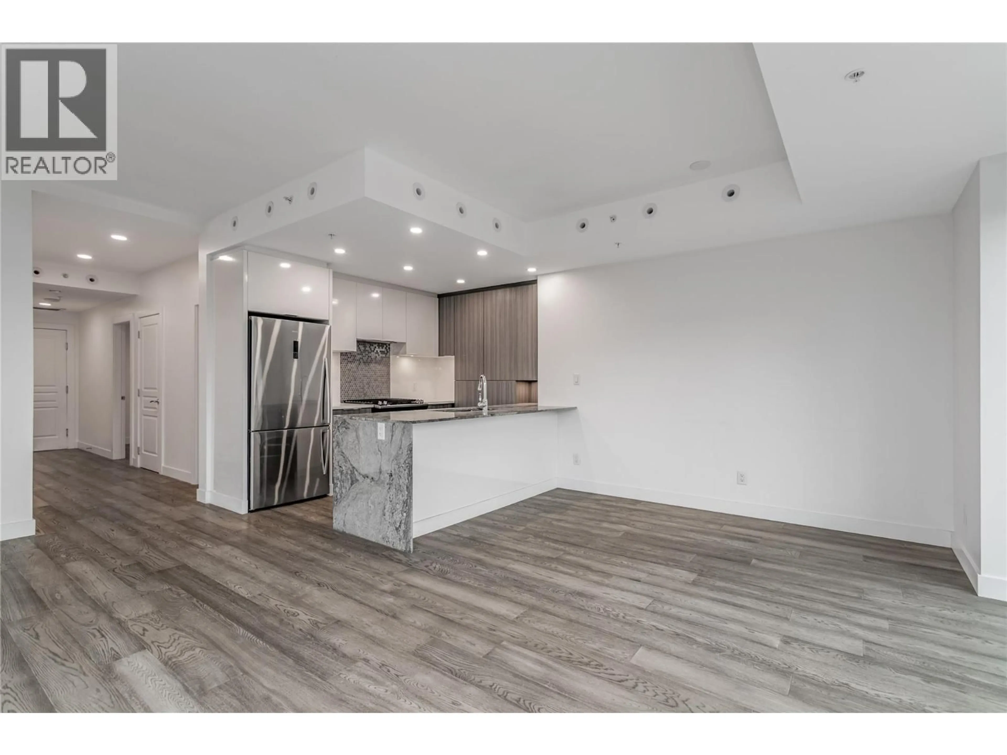 Open concept kitchen, unknown for 502 - 1151 SUNSET DRIVE, Kelowna British Columbia V1Y0G2
