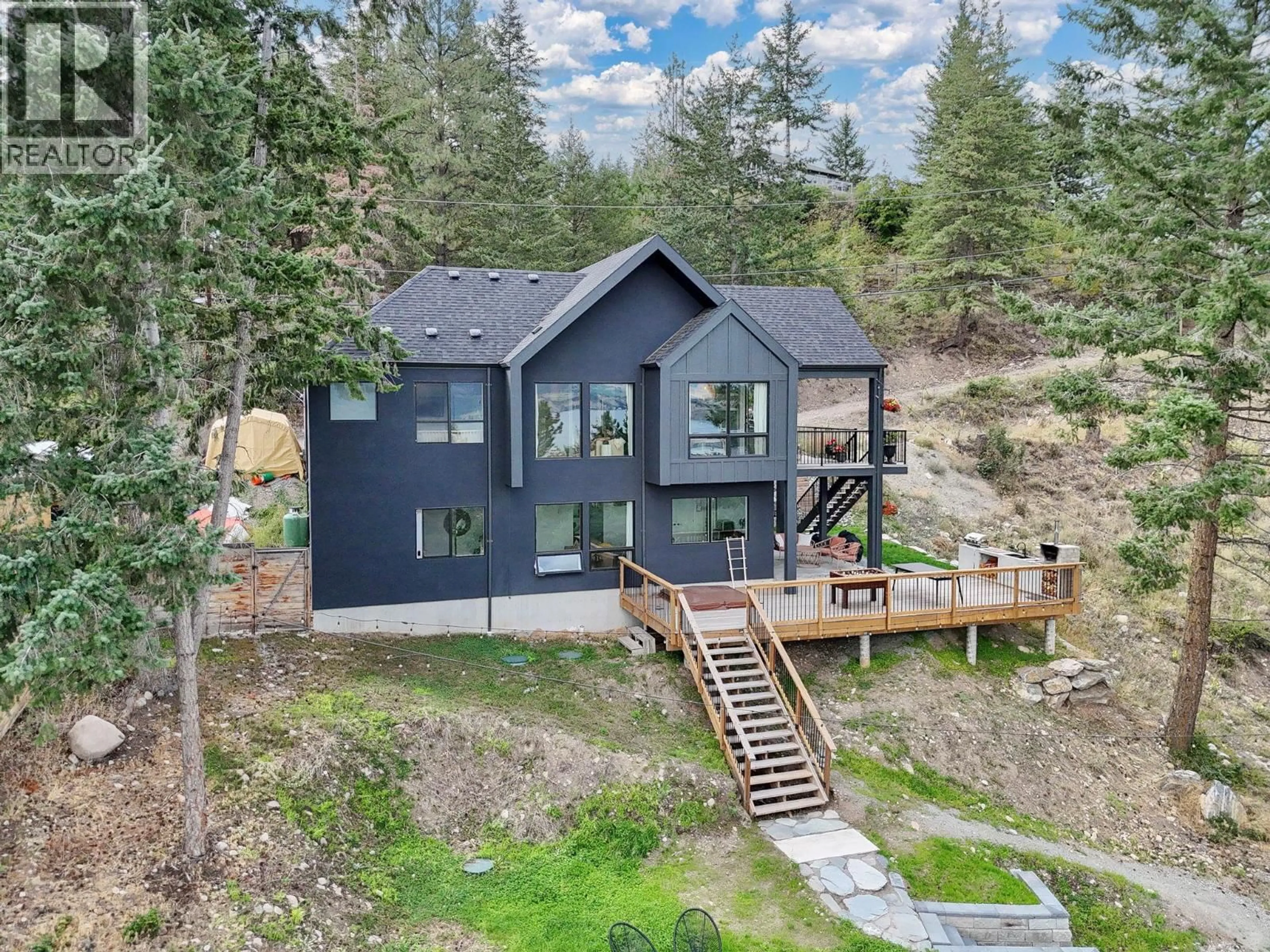 A pic from outside/outdoor area/front of a property/back of a property/a pic from drone, mountain view for 10 VALLEY DRIVE, Vernon British Columbia V1H2B4