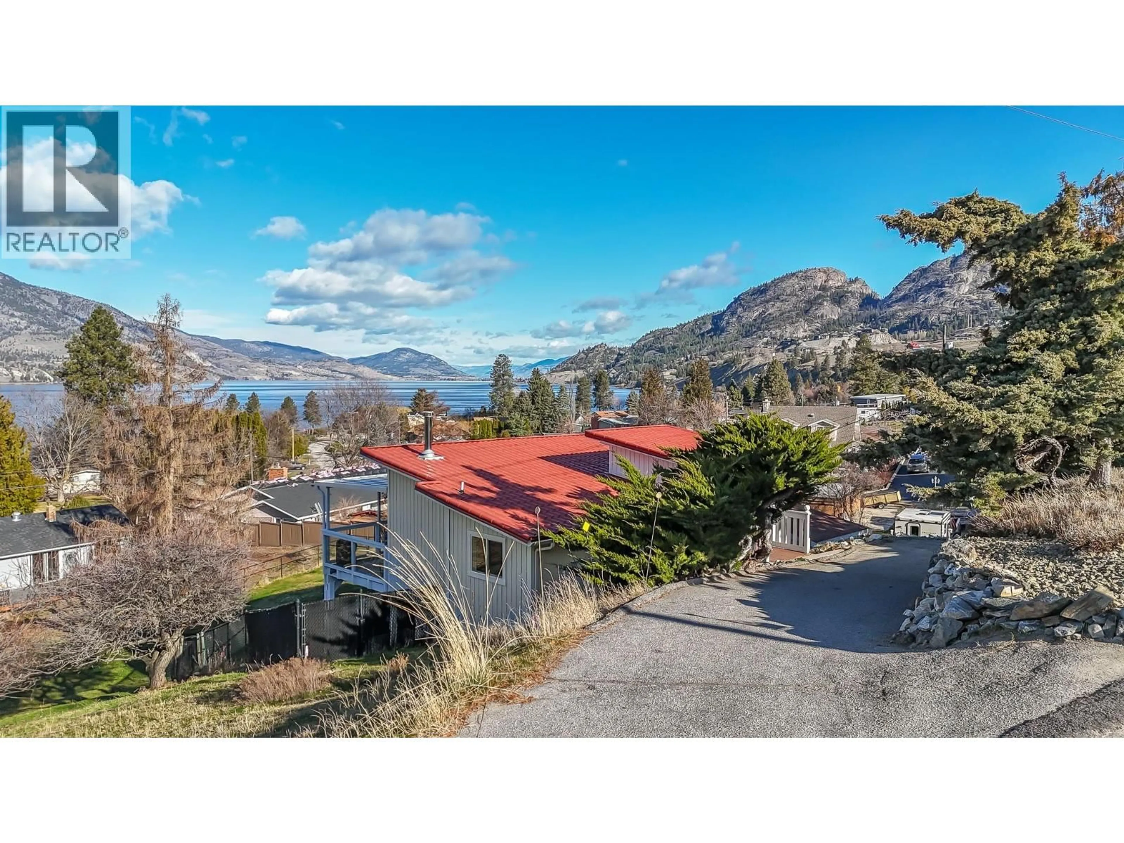A pic from outside/outdoor area/front of a property/back of a property/a pic from drone, mountain view for 334 CARMEL CRESCENT, Okanagan Falls British Columbia V0H1R5