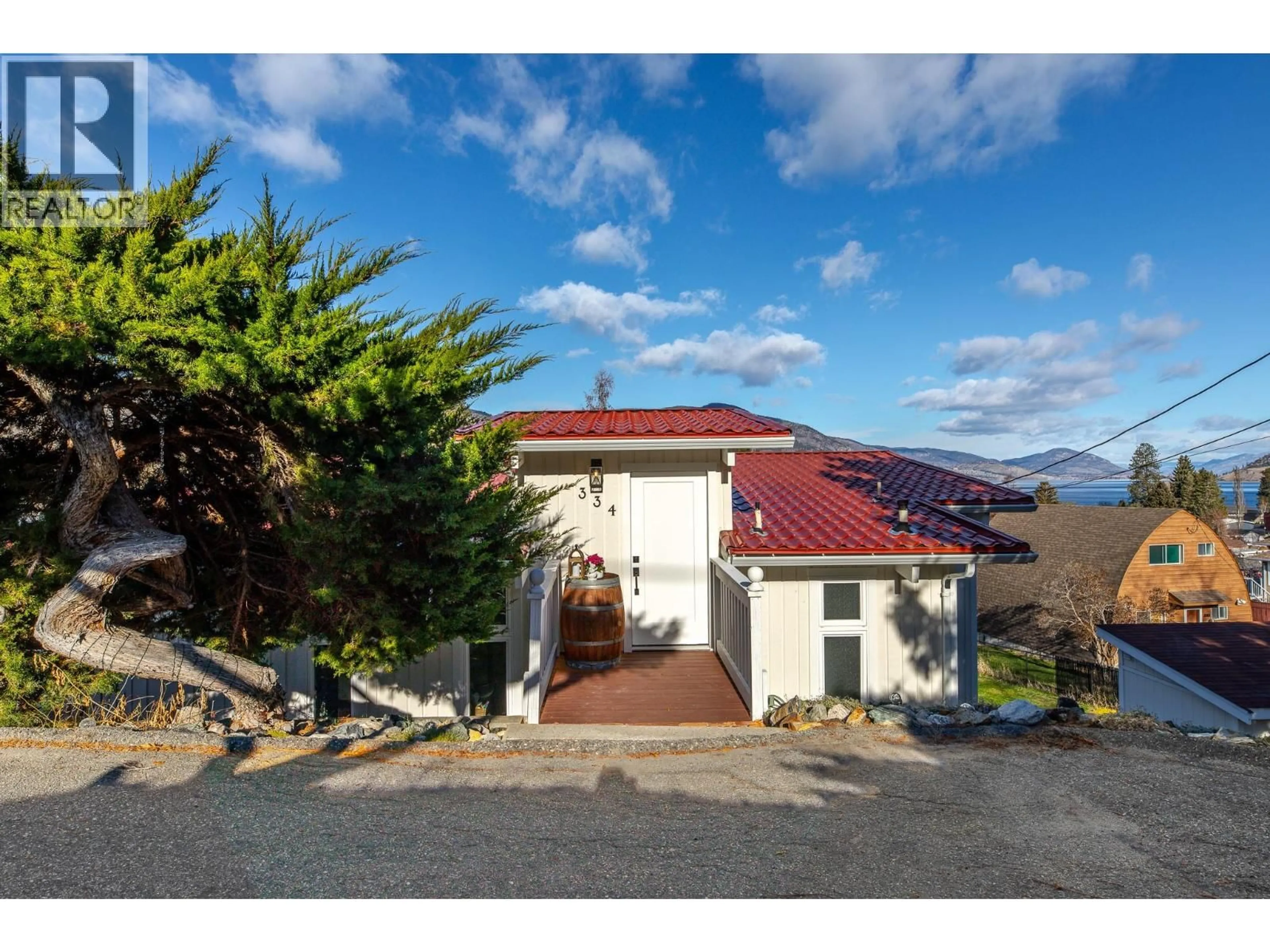 A pic from outside/outdoor area/front of a property/back of a property/a pic from drone, mountain view for 334 CARMEL CRESCENT, Okanagan Falls British Columbia V0H1R5