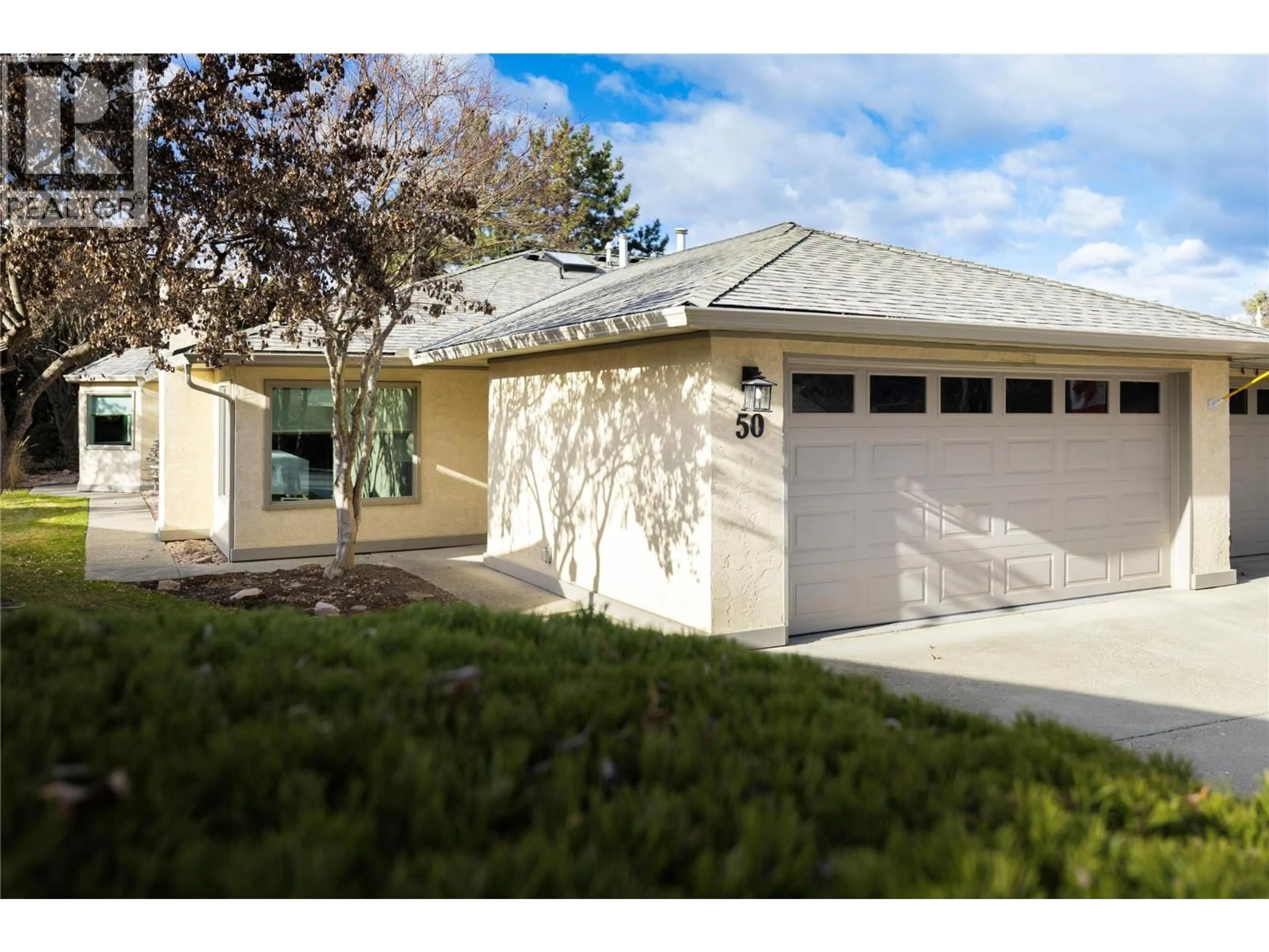 Home with vinyl exterior material, street for 50 - 1400 14 AVENUE, Vernon British Columbia V1B2S9