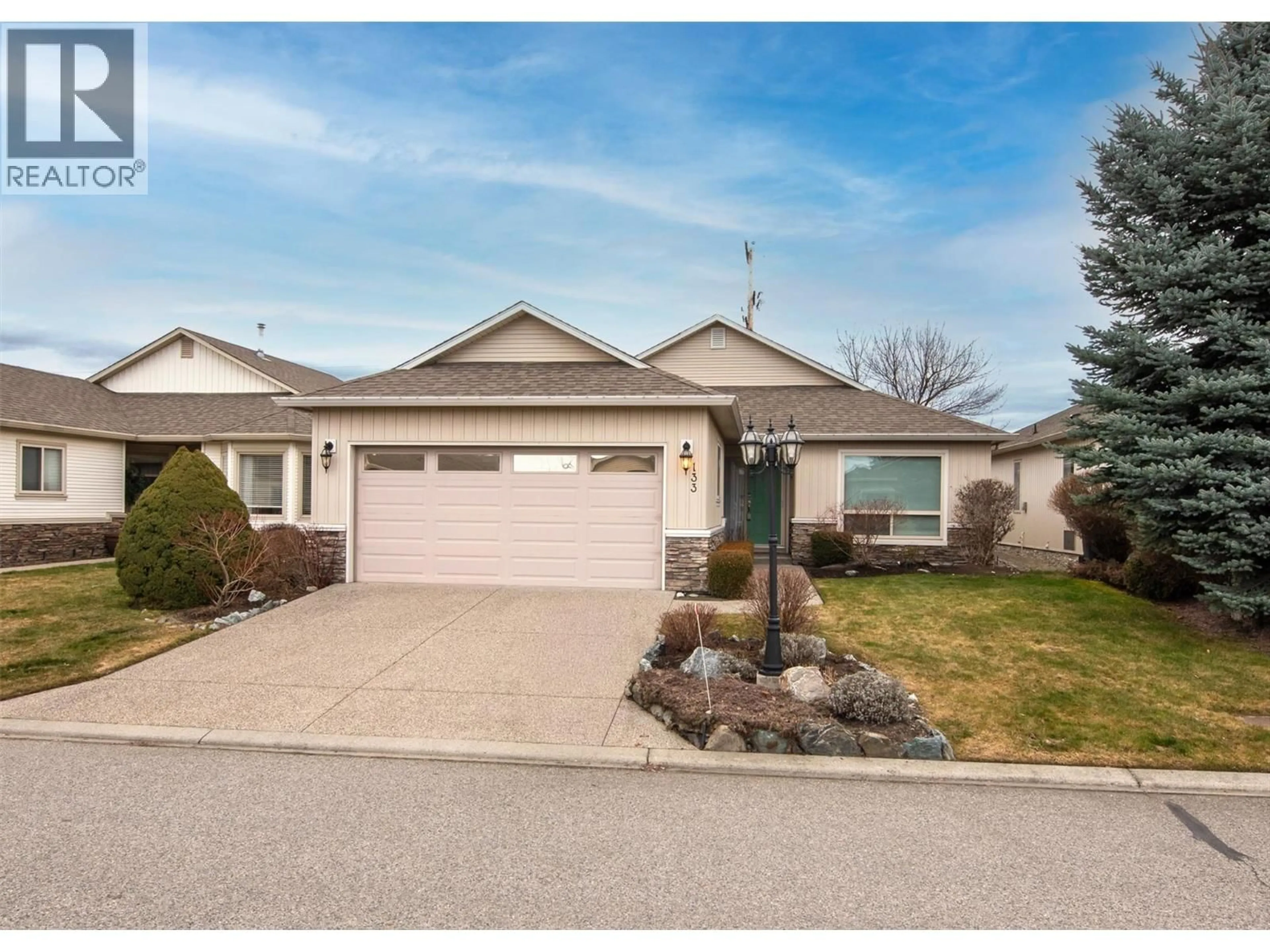 Home with vinyl exterior material, street for 133 - 2365 STILLINGFLEET ROAD, Kelowna British Columbia V1W4X5