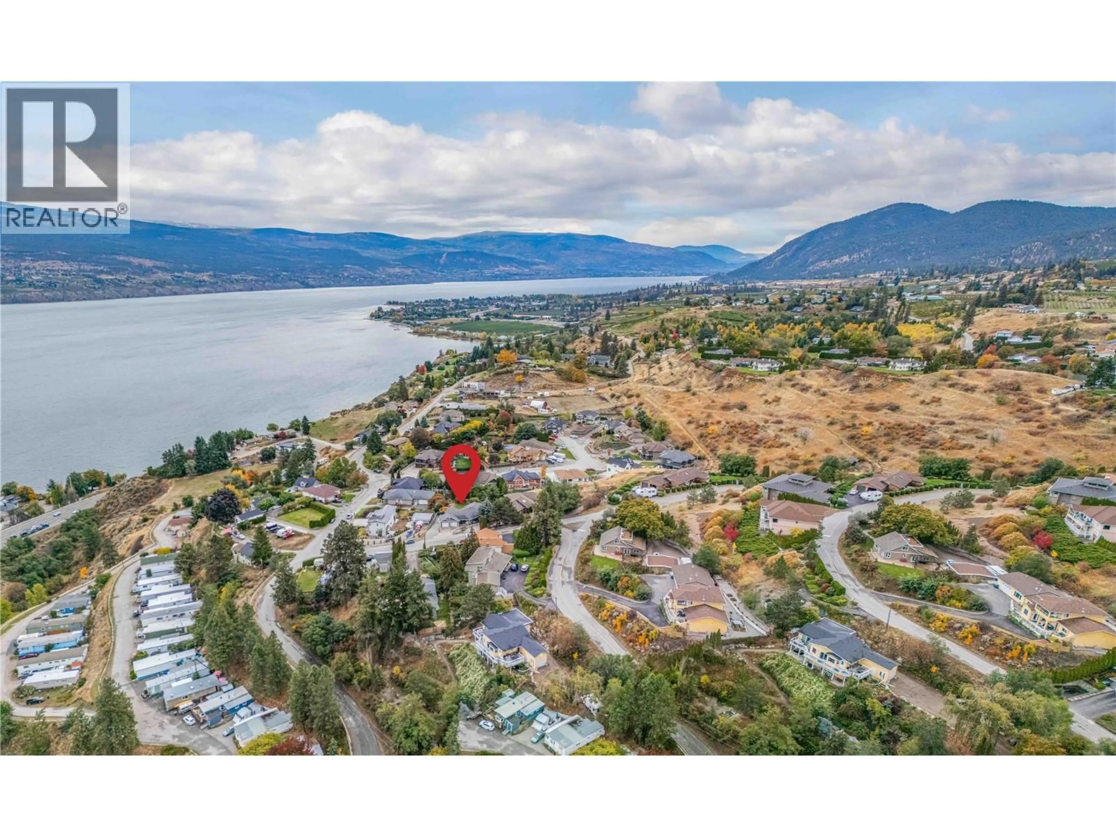 A pic from outside/outdoor area/front of a property/back of a property/a pic from drone, water/lake/river/ocean view for 5408 CLARK STREET, Summerland British Columbia V0H1Z4