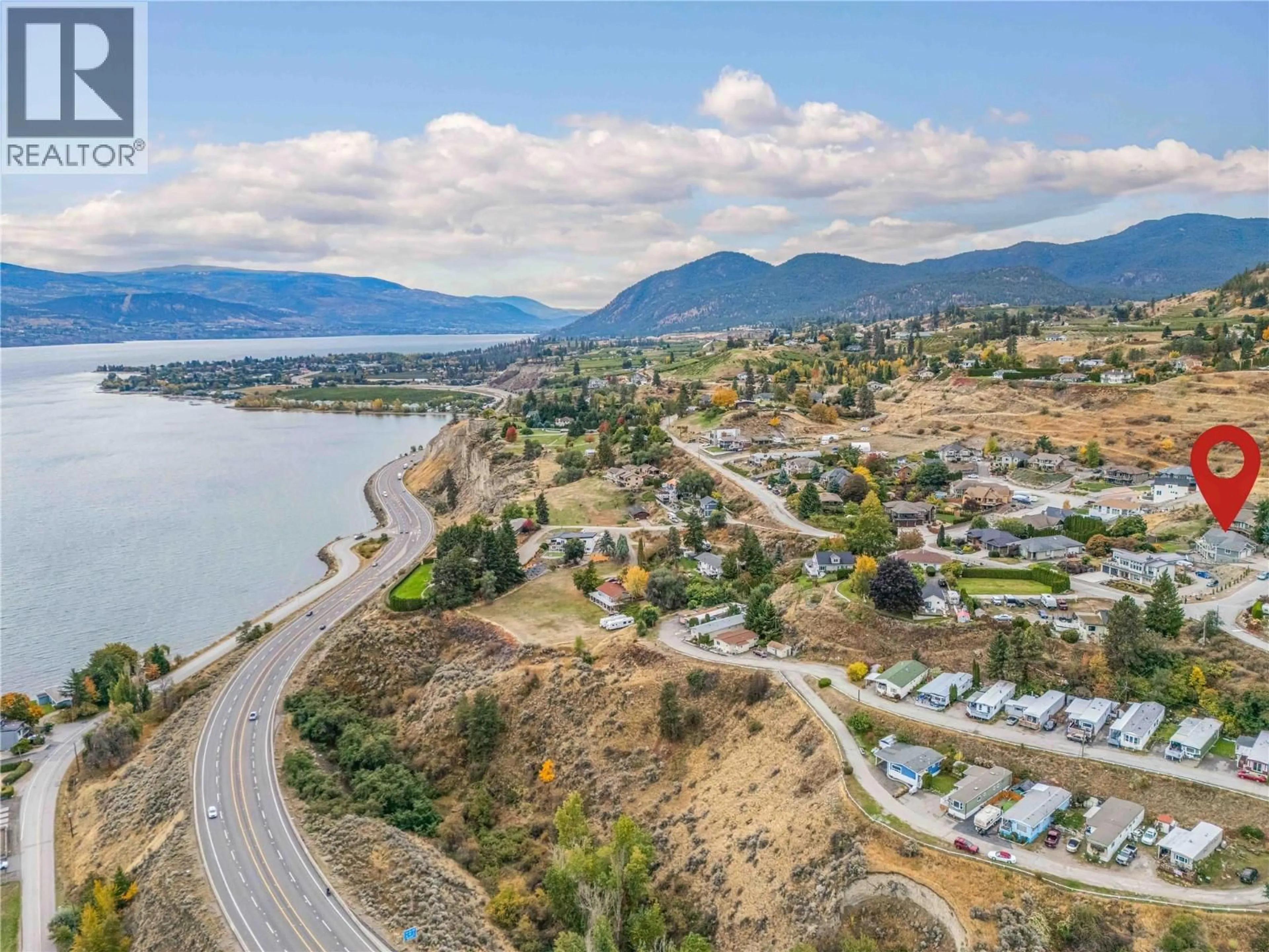 A pic from outside/outdoor area/front of a property/back of a property/a pic from drone, water/lake/river/ocean view for 5408 CLARK STREET, Summerland British Columbia V0H1Z4
