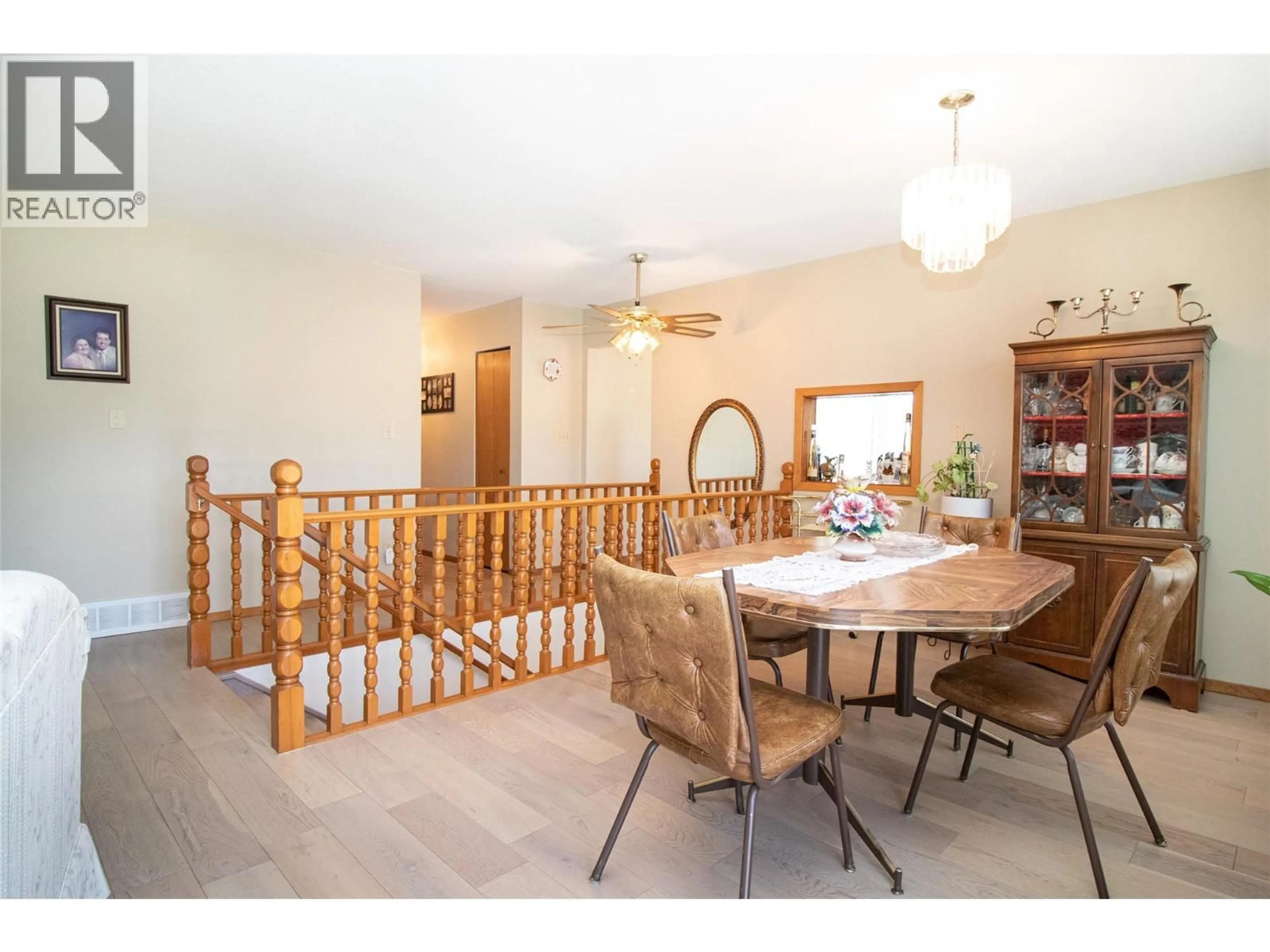 Dining room, wood/laminate floor for 532 O'KEEFE COURT, Kelowna British Columbia V1X6B1
