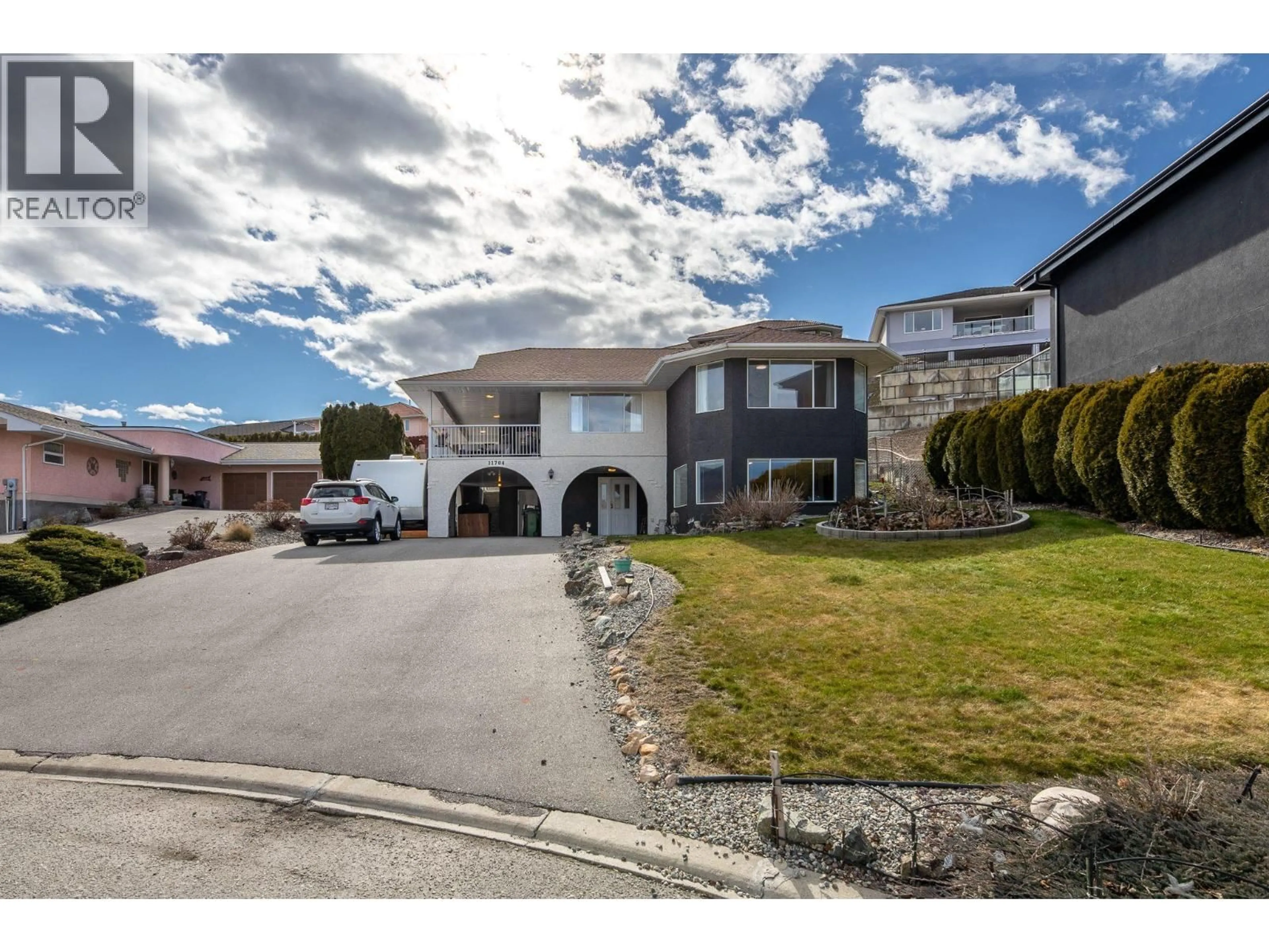 A pic from outside/outdoor area/front of a property/back of a property/a pic from drone, street for 11704 QUAIL RIDGE PLACE, Osoyoos British Columbia V0H1V4